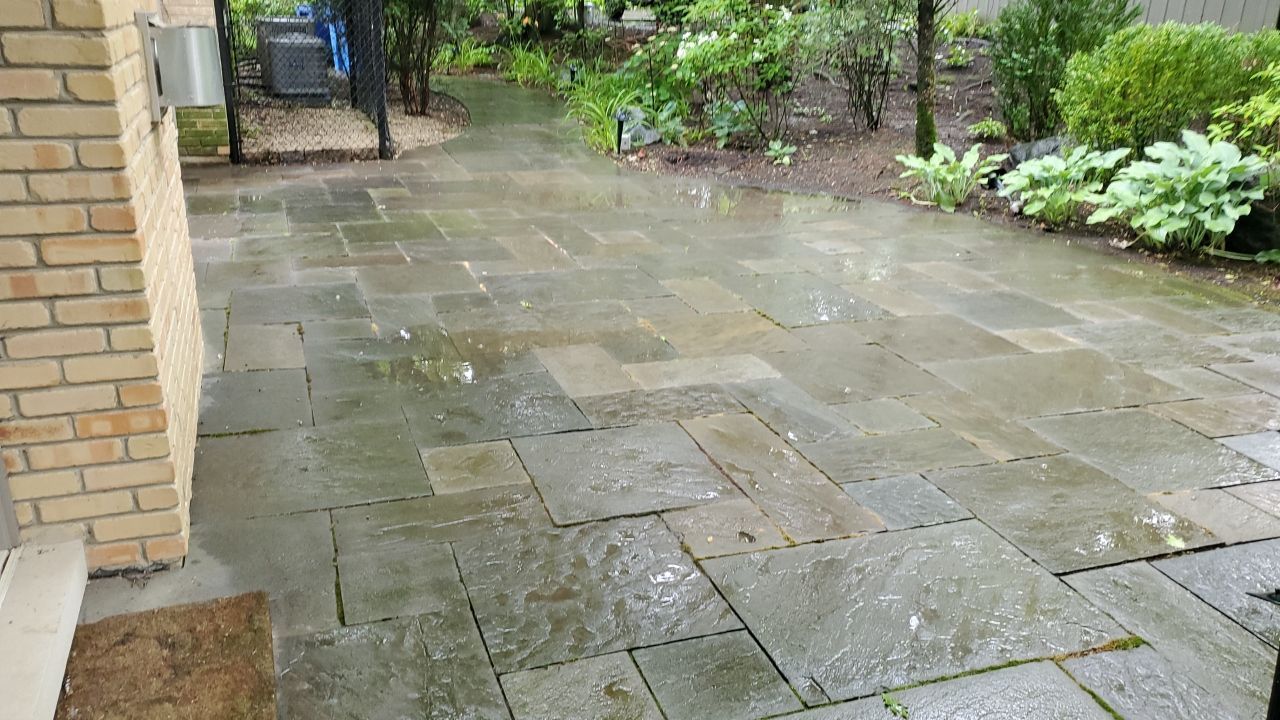 Bluestone patio cleaning by Northern Power Washing LLC.