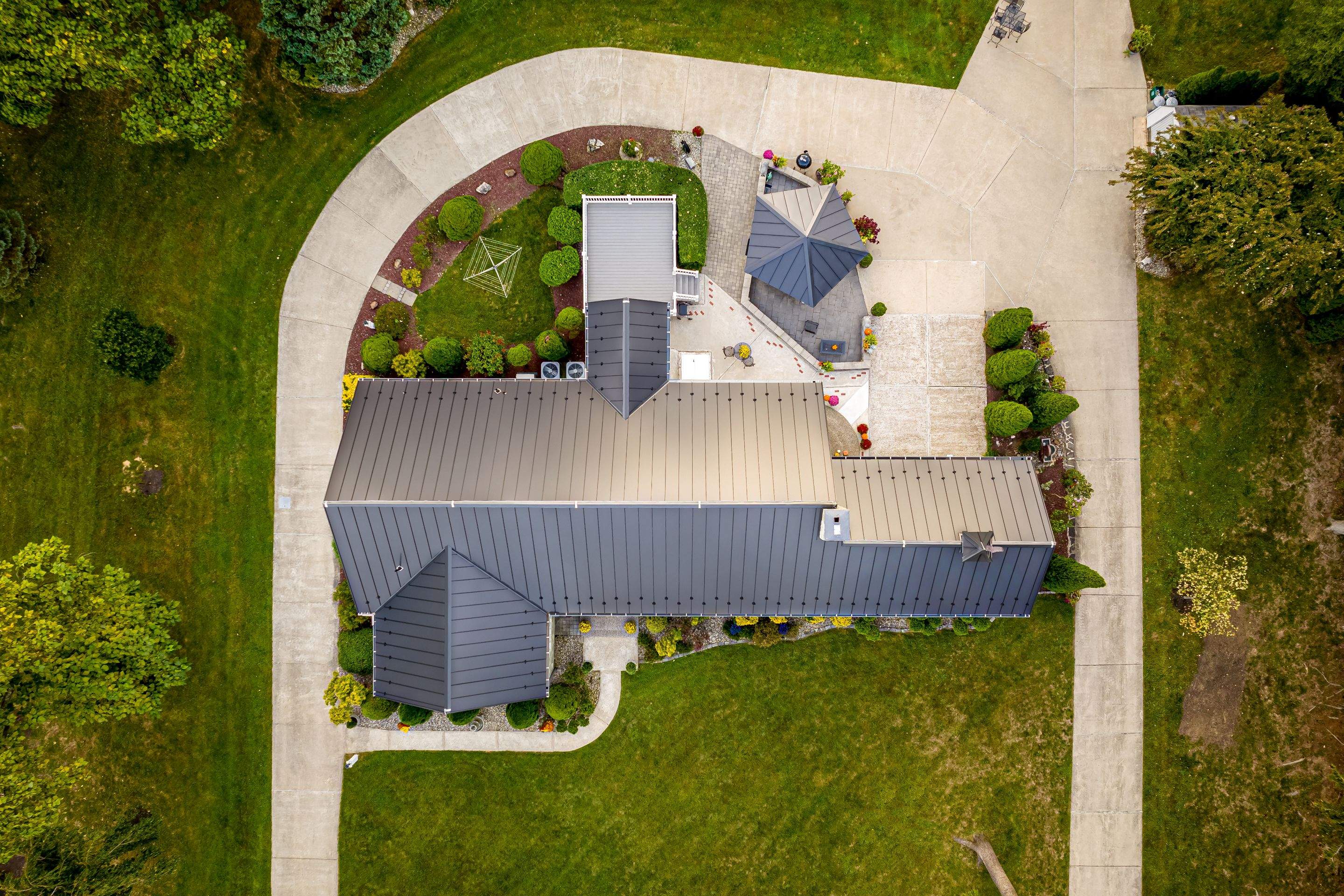 Standing Seam Metal roof-black by Esh Builders