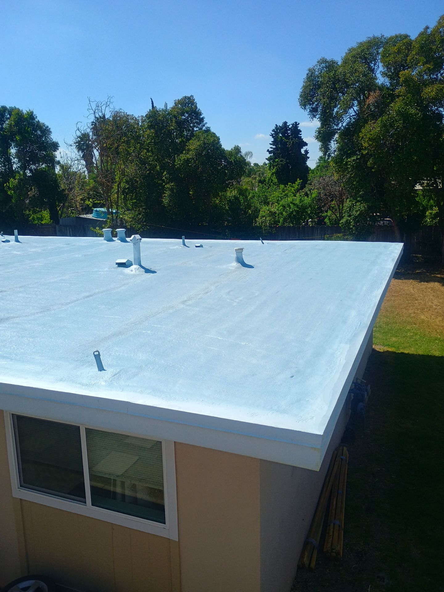 Foam Refurbish using Conklin Benchmark/PUMA XL coatings and spray foam by Straight Edge Roofing Inc