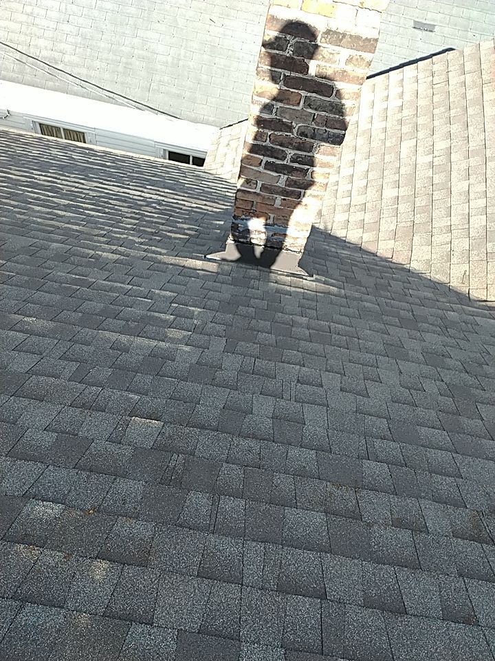 Residential Roofing Installation using Roof Replacement by American Roofing & Construction LLC