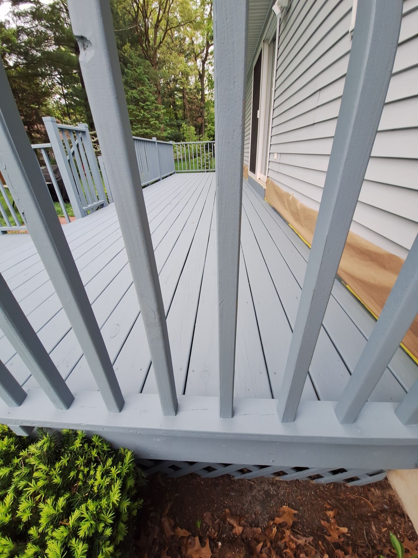Repaint bedroom furniture, Pergola, and doors. Stain decking by Gordon Painting
