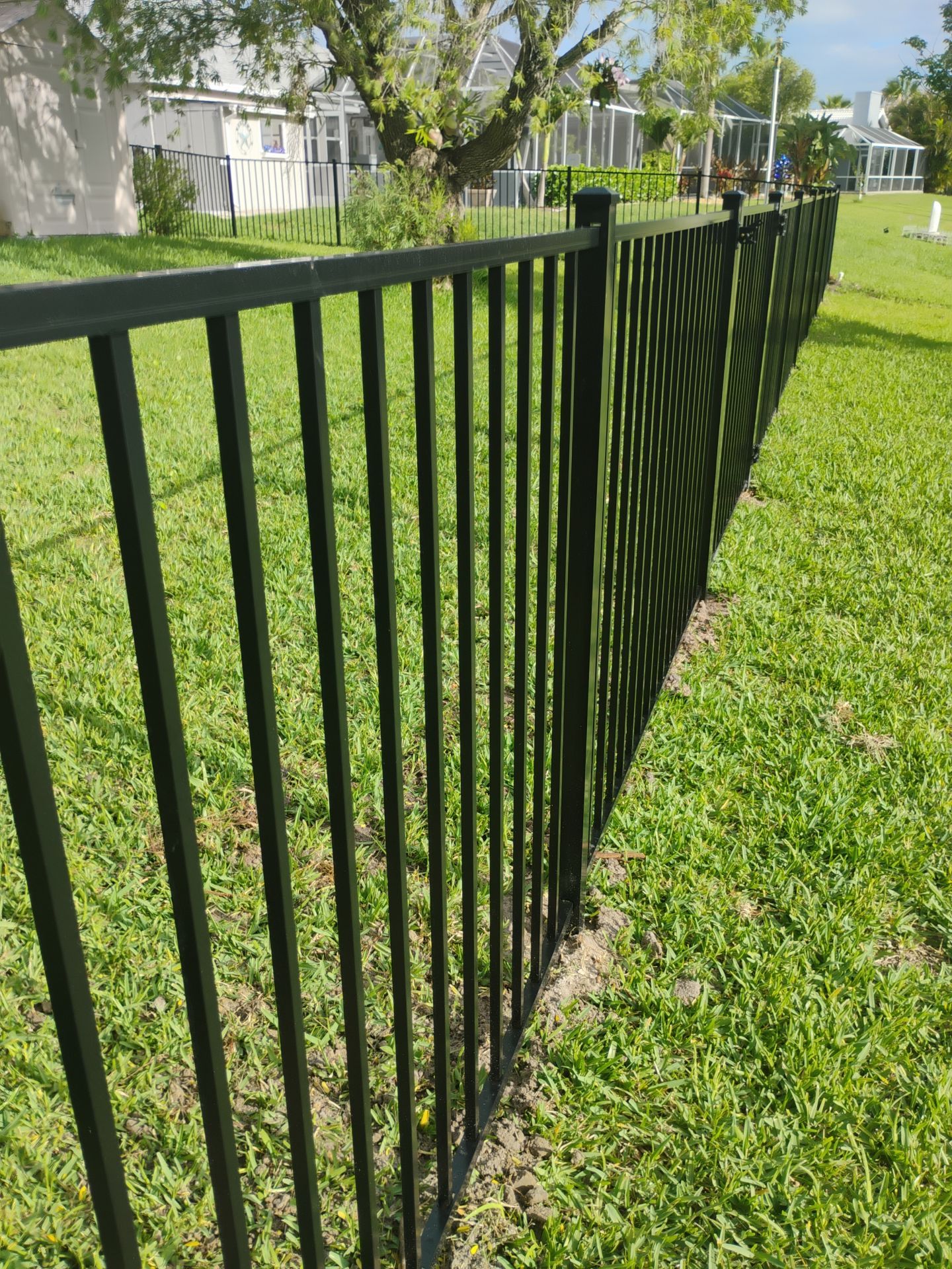 Black Aluminum Picket Fence Installation for Nokomis Waterfront Property by True Fence LLC