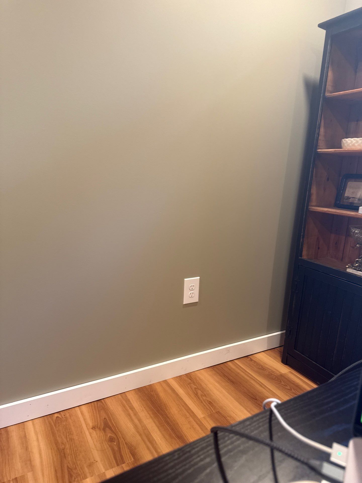 Lincoln Interior Renovation Featuring Sage Green Walls and Laminate Flooring by CompanyCam Sales Demo