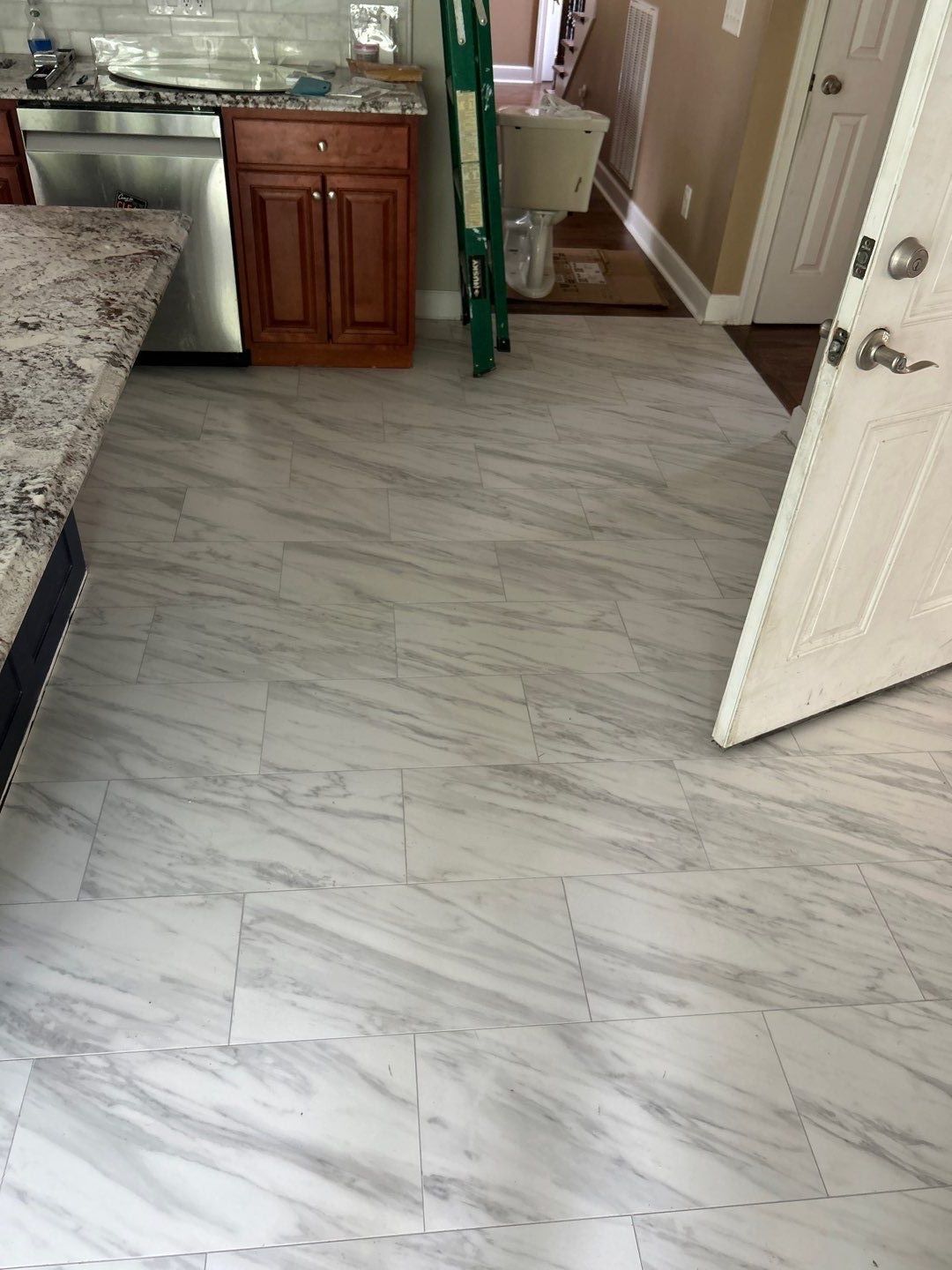Kitchen floor refresh  by Footprints Floors of Nashville
