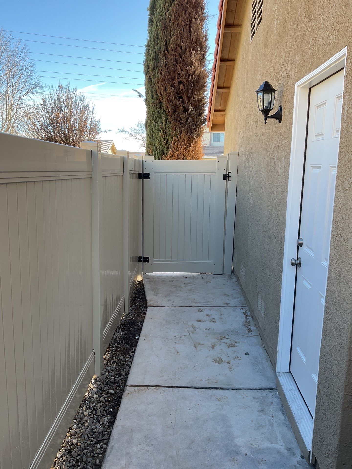 Beautiful vinyl fence installation by Fence Guys Inc.