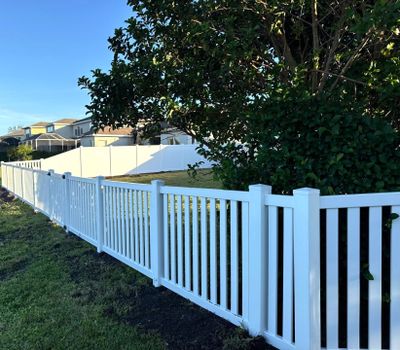 Vinyl Picket Fence Installation using 6Ft White Vinyl Privacy Fence with a 4Ft White Clearwater Picket Fence
