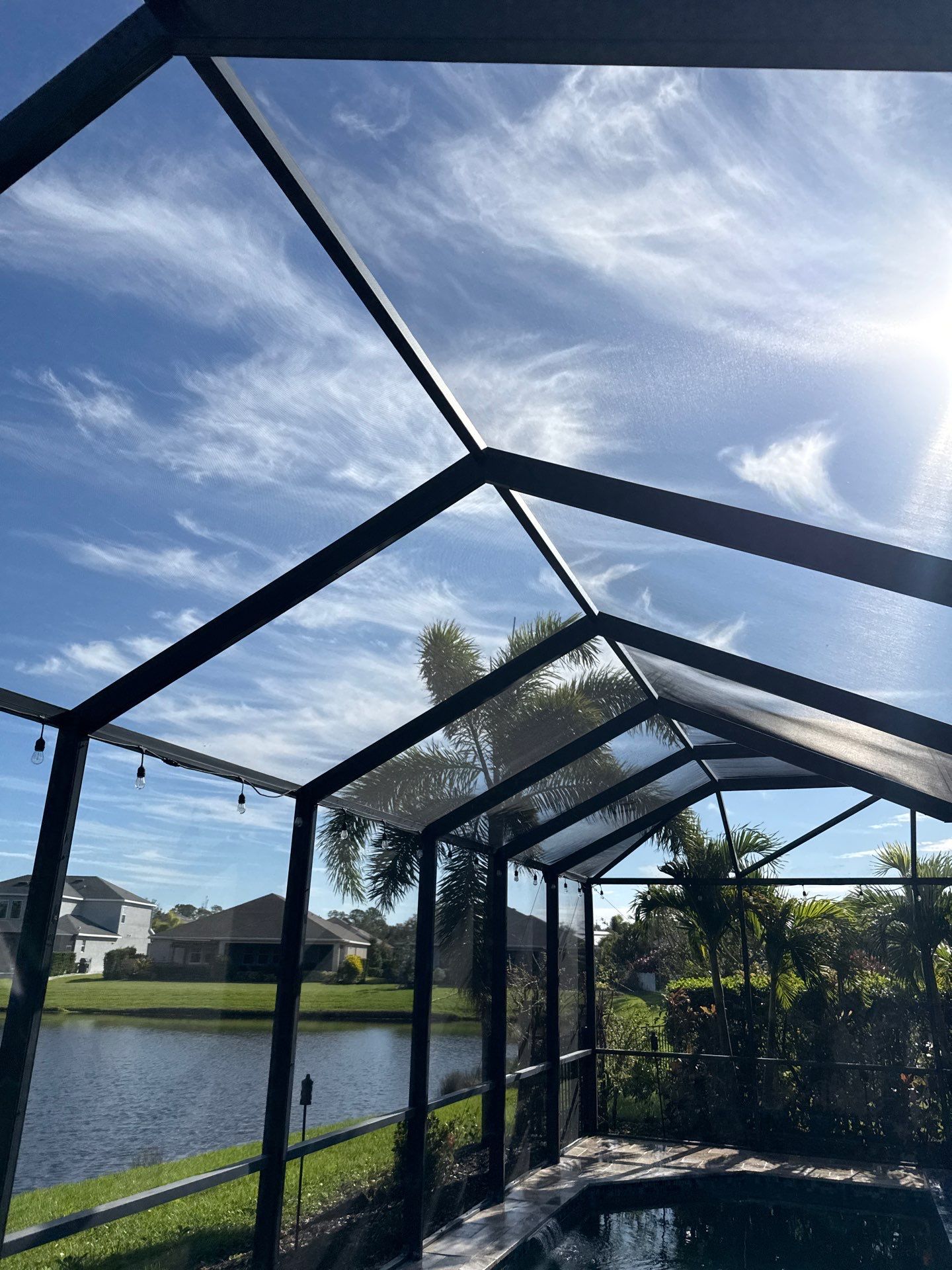Travertine Pool Deck and Screen Enclosure Cleaning in Ellenton, FL | Oakleaf Hammock Community by Sunshine AquaWash