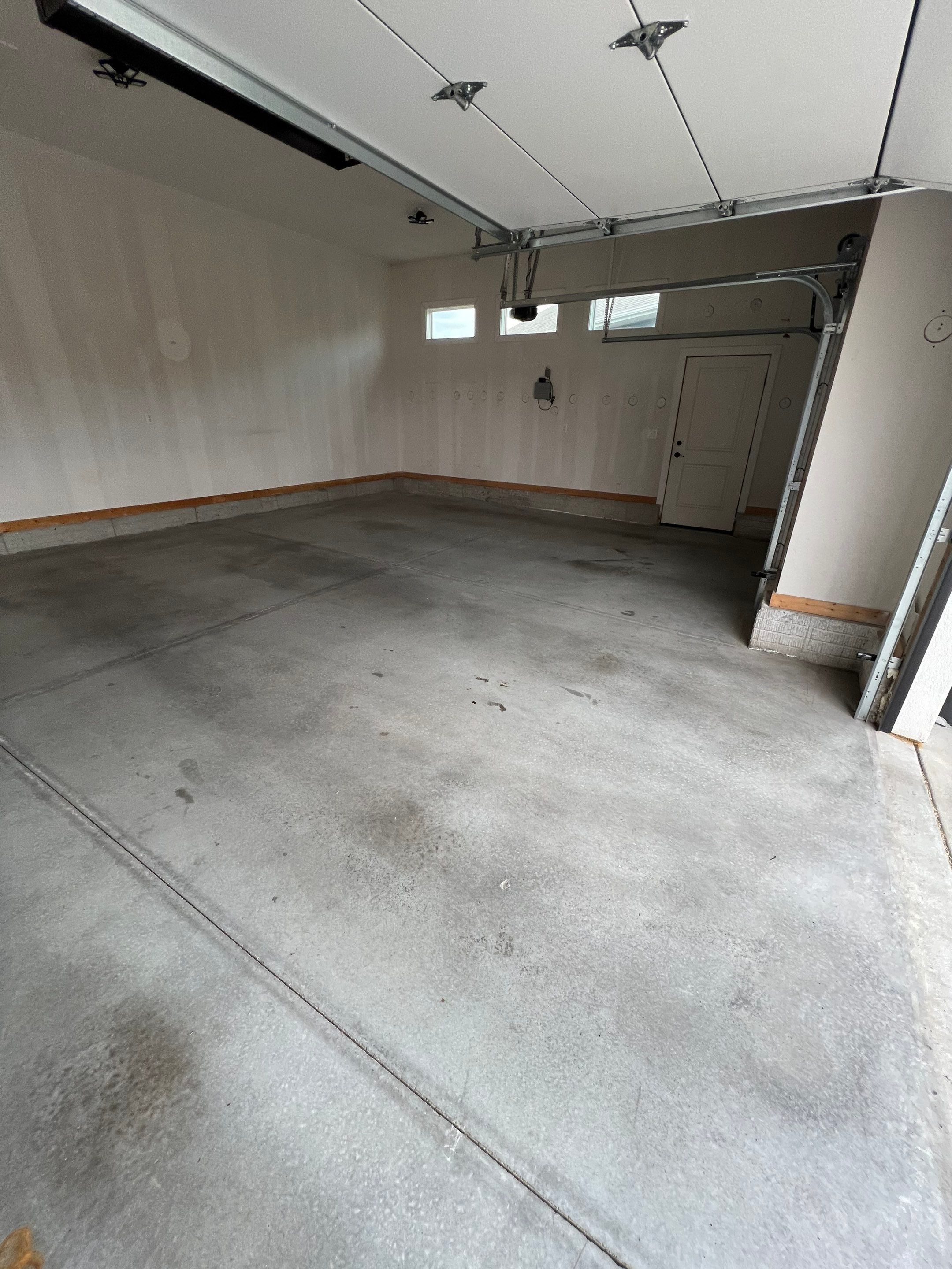 Garage painting and new floor by Cutting edge painting 