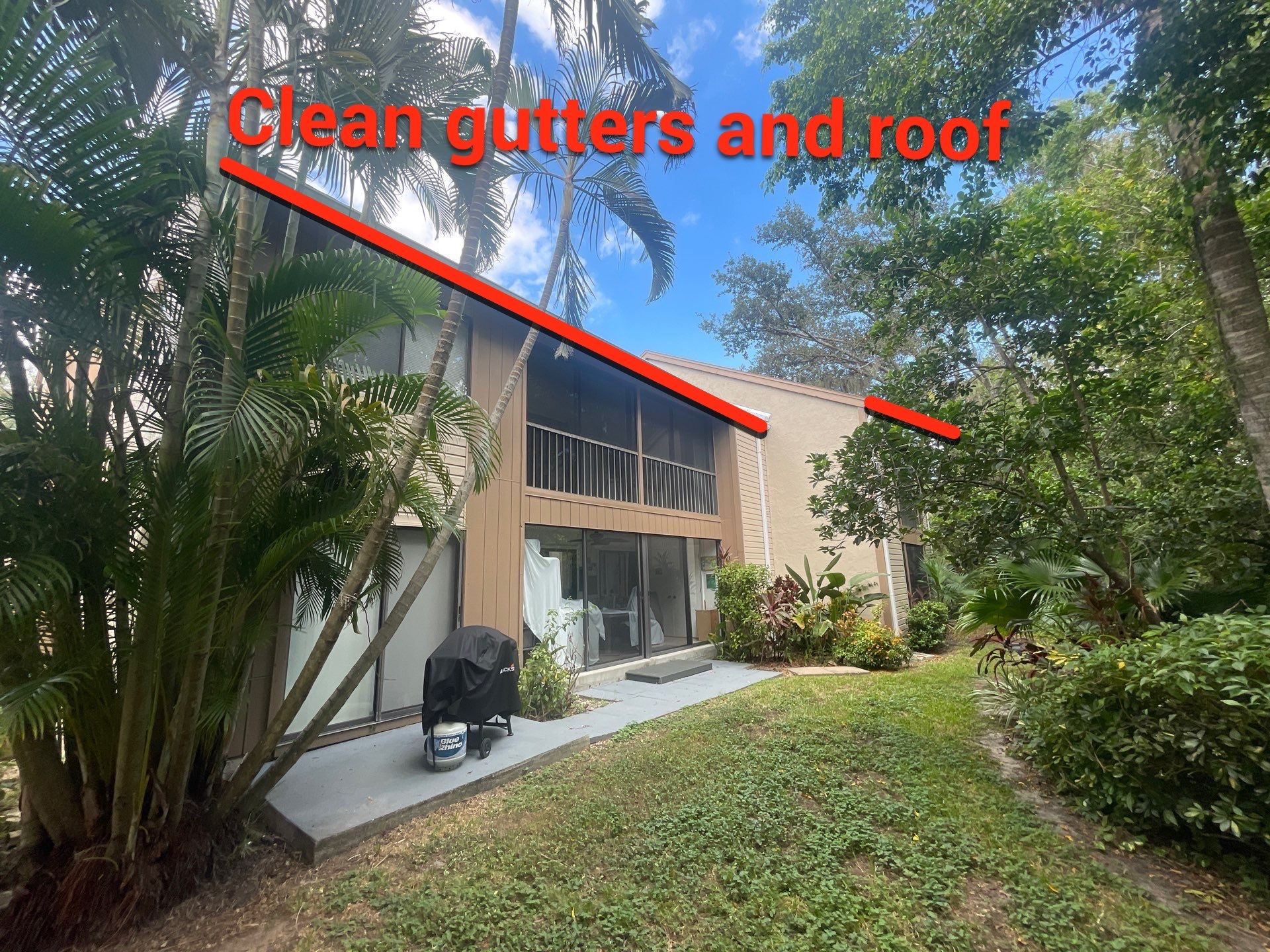 Clean Gutters and Roof in Sarasota FL by Gutter Professors