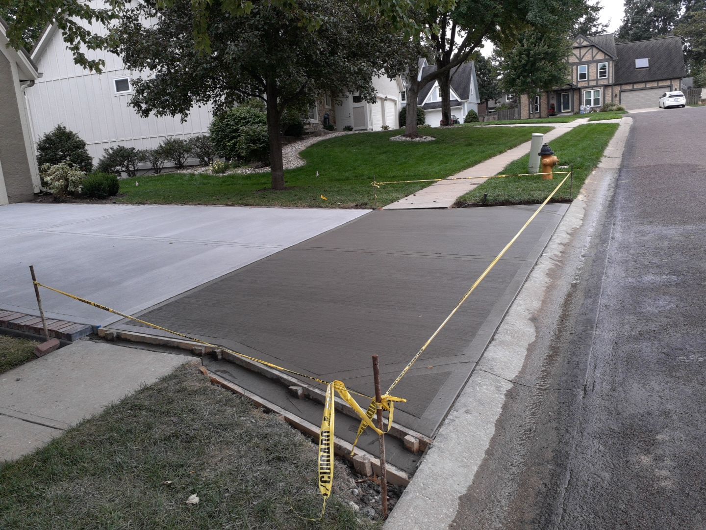 New Driveway and Sidewalk by LAND ESCAPES LLC