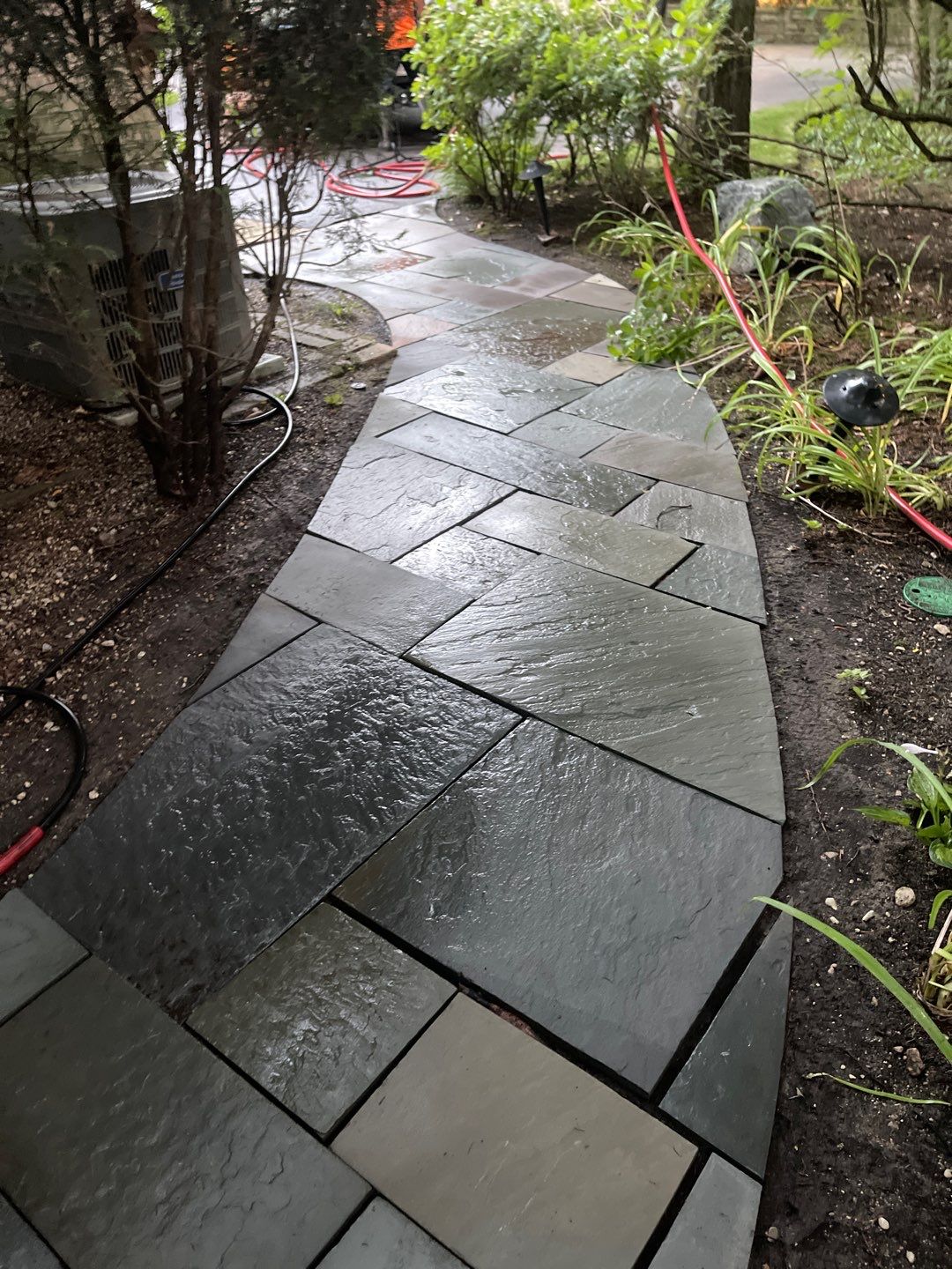 Bluestone patio cleaning by Northern Power Washing LLC.