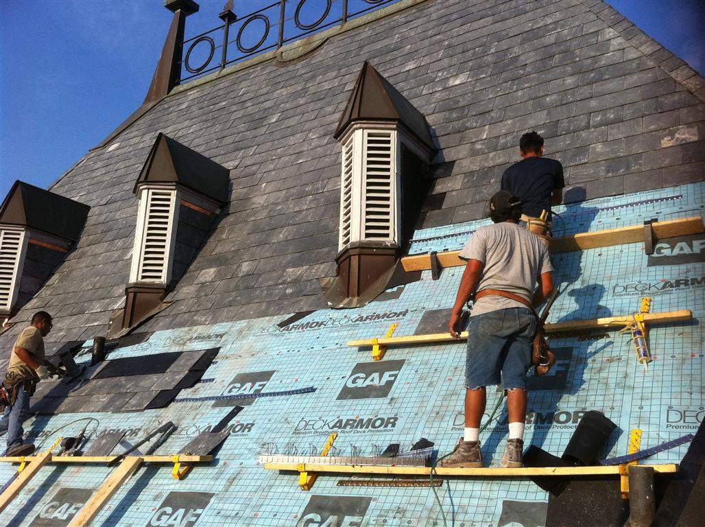 Historic Building ROOF REPLACEMNT with GAF TruSlate  on steep slop and Versico 60mil TPO on flat roof by Gorilla Exteriors Contracting, LLC