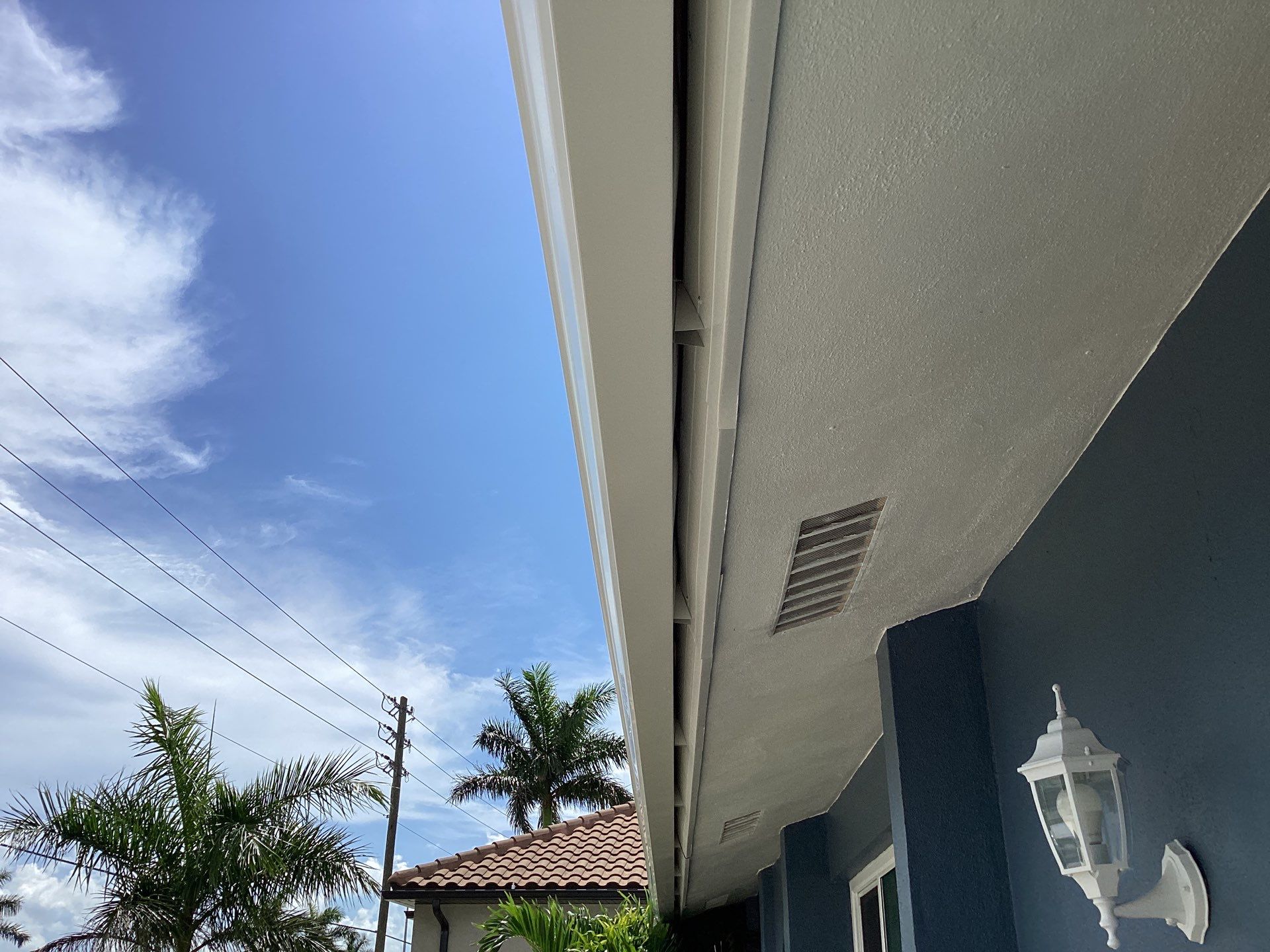 White Downspouts and Gutters Combo in Punta Gorda FL by Gutter Professors