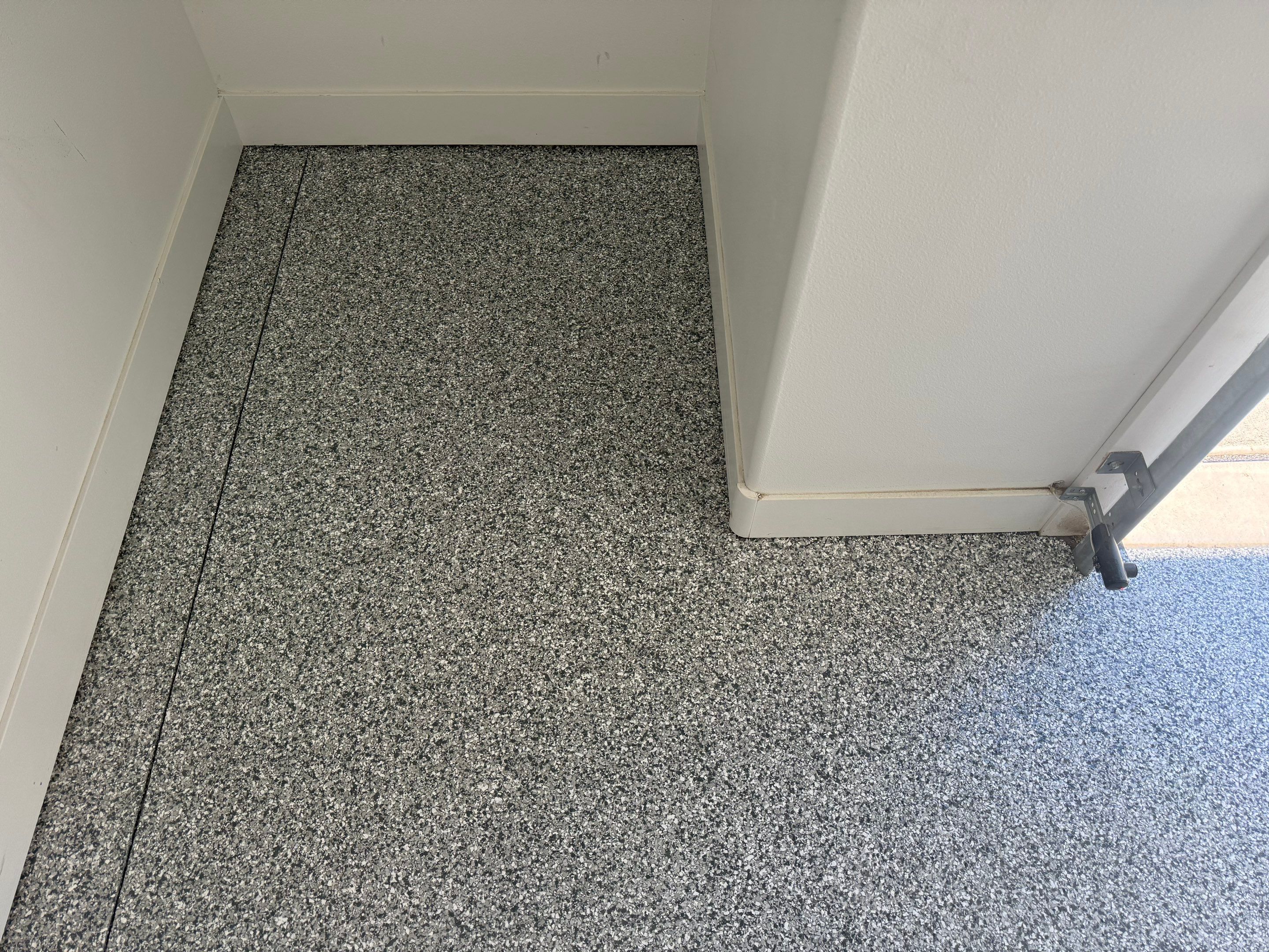 Gravel Flake Garage Floor Coating in Yankton by Select Painting, Coatings & Garage Cabinets