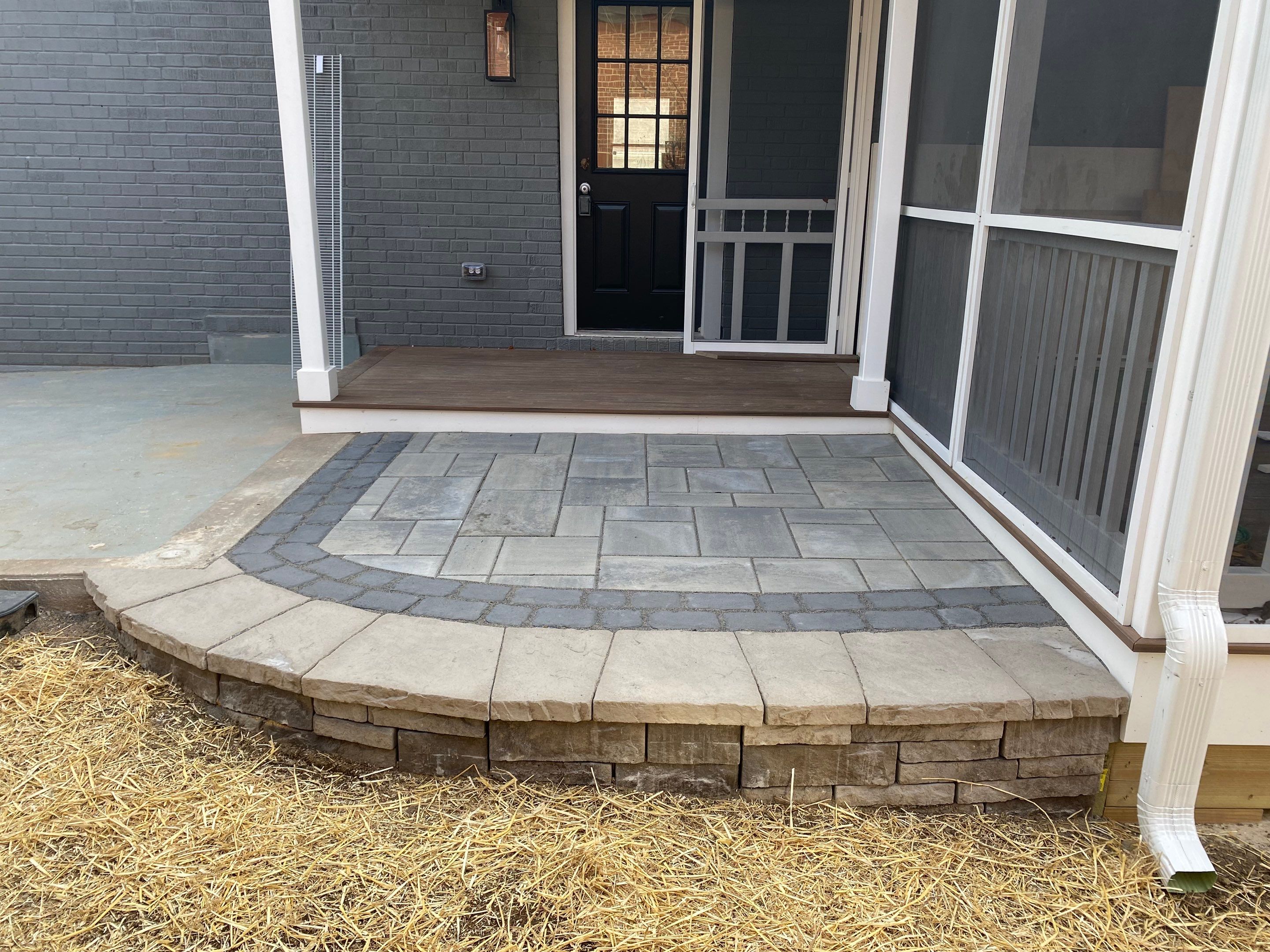 Retaining wall, walkway, small patio and landscape install by The Smet Companies, LLC