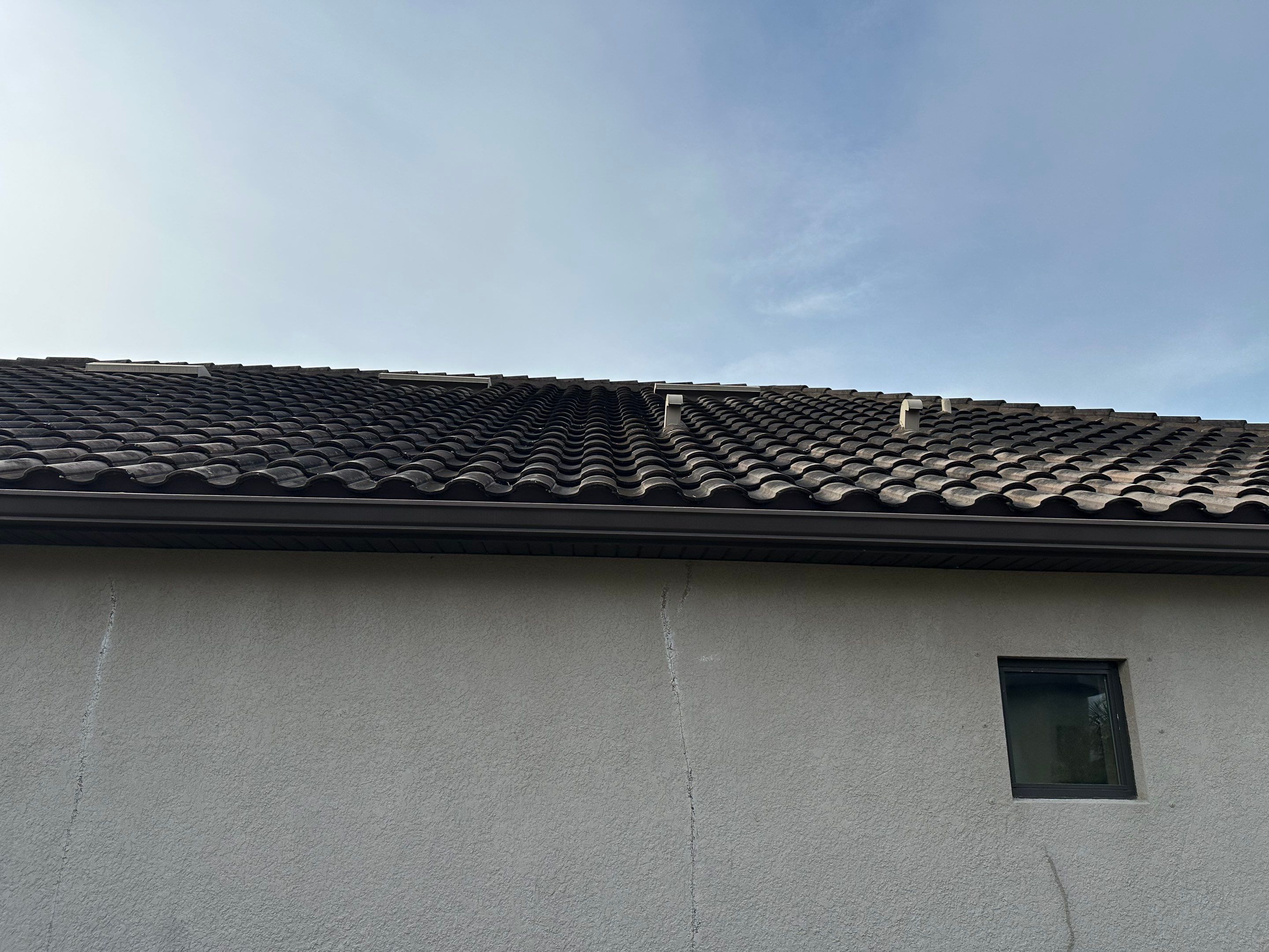 Concrete Tile Roof, Paver Pool Deck, Screen Enclosure & Driveway Cleaning in Artisan Lakes Esplanade, Palmetto, FL | Sunshine AquaWash by Sunshine AquaWash