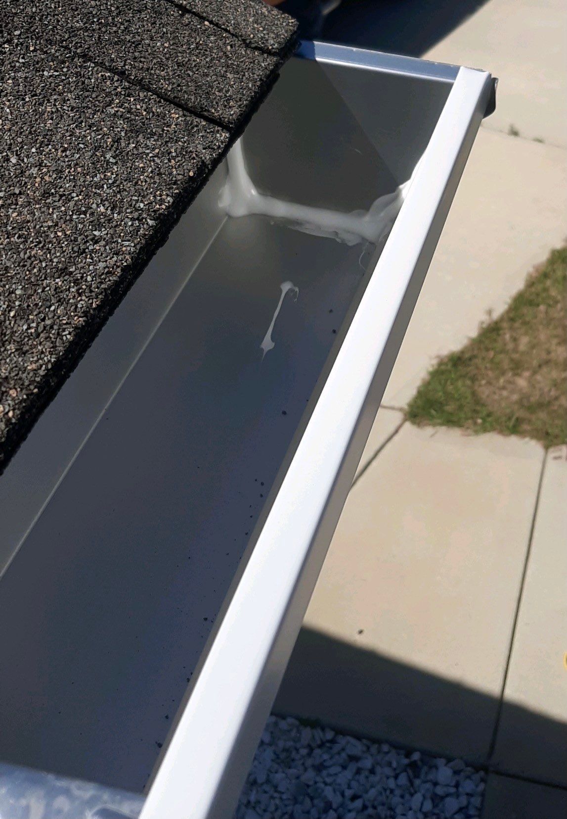 Gutter Installation Using White K-Style Seamless Gutters by Gutter Professors