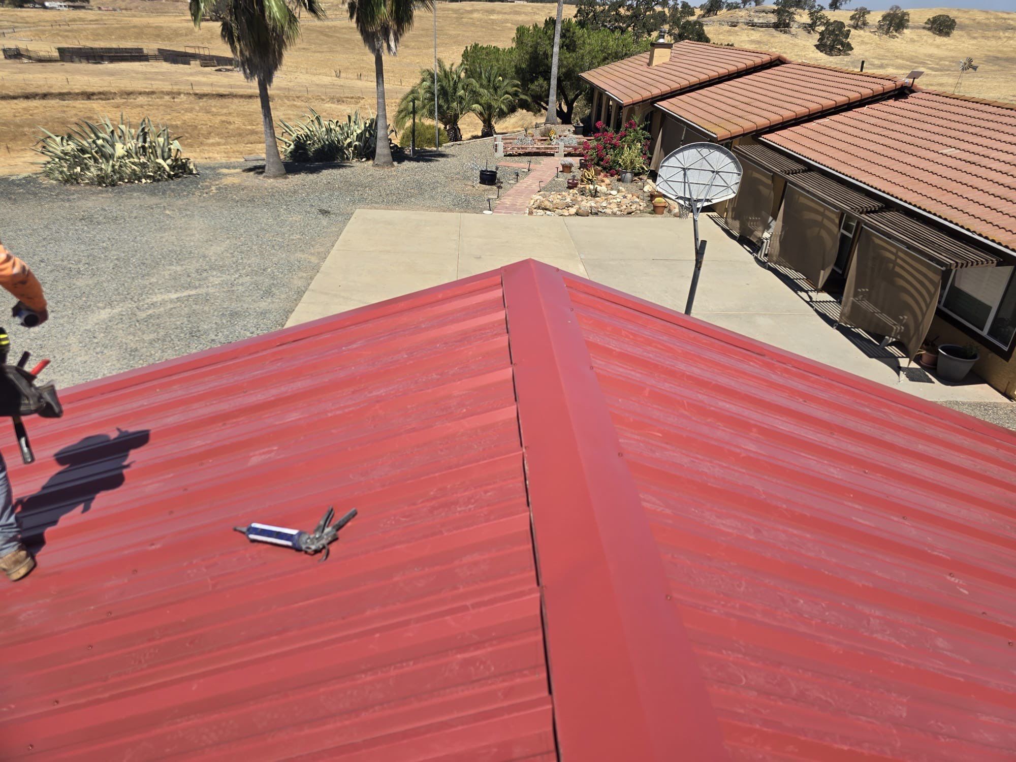 Metal roofing installation using PBR panel metal roofing material w/ accessories by Straight Edge Roofing Inc