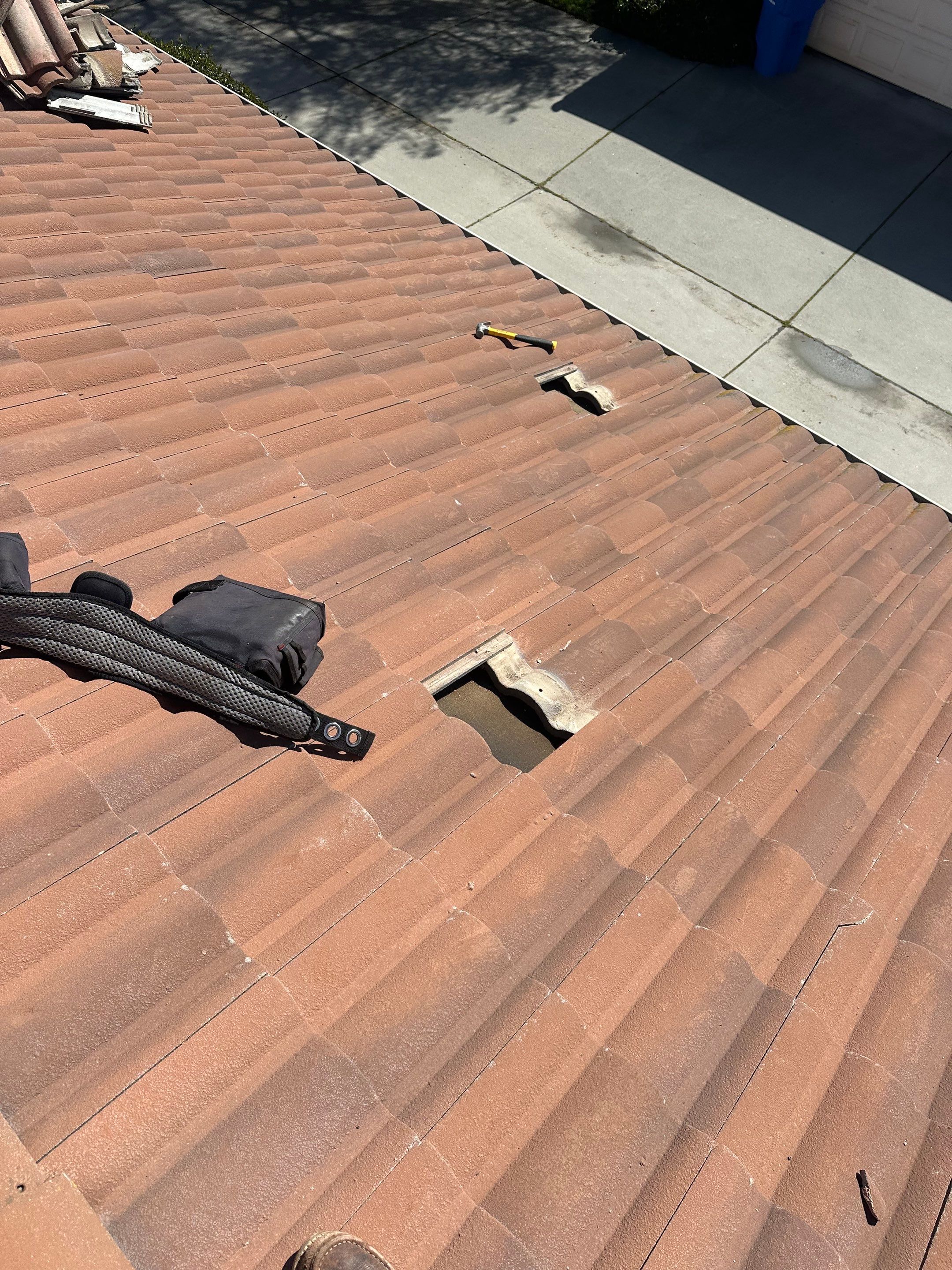 Tile Roof repair by Grandmark Service Company