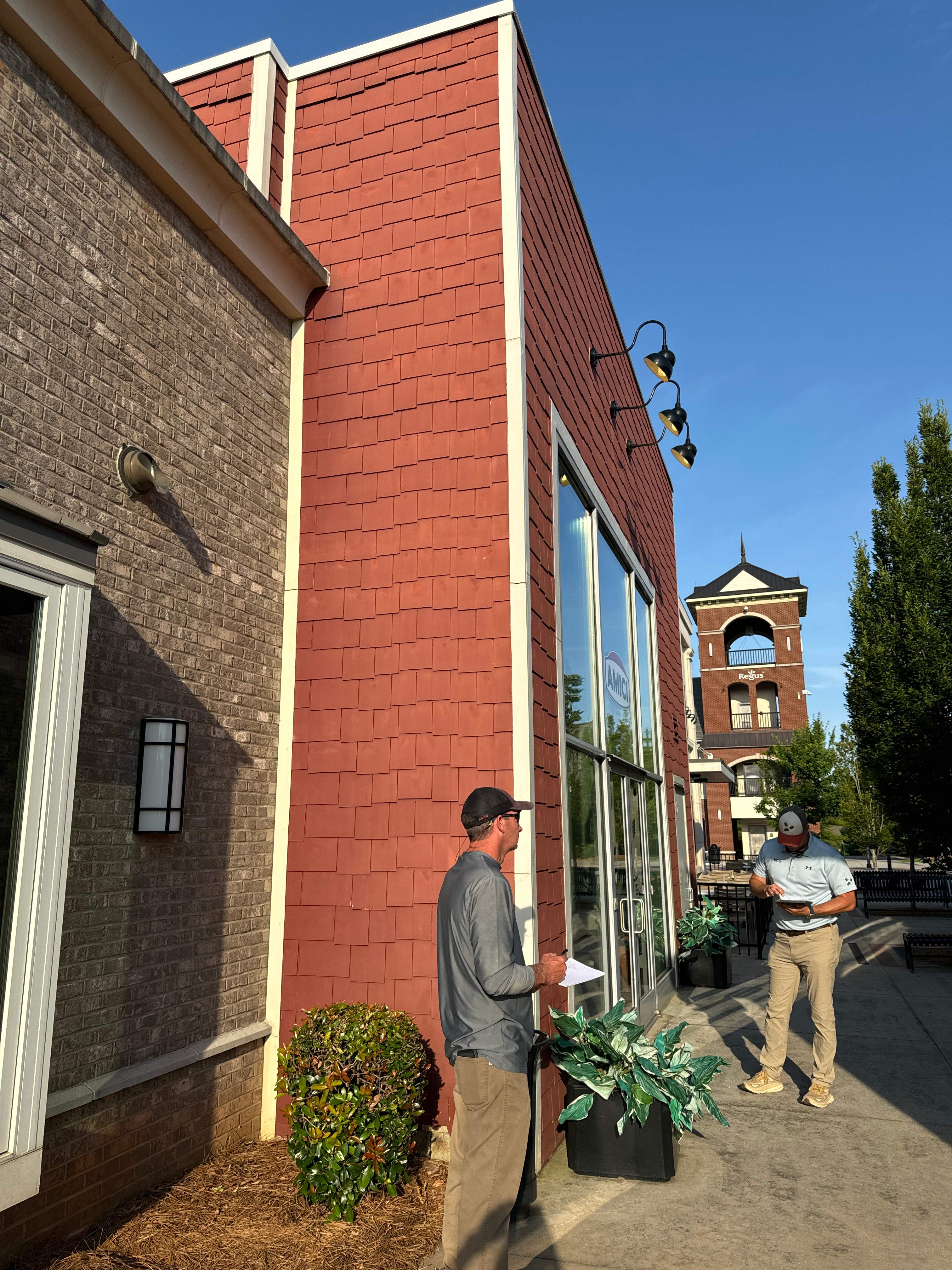 Commercial Exterior & Stairwell Painting – Corner Market by PGP Surface Solutions, LLC