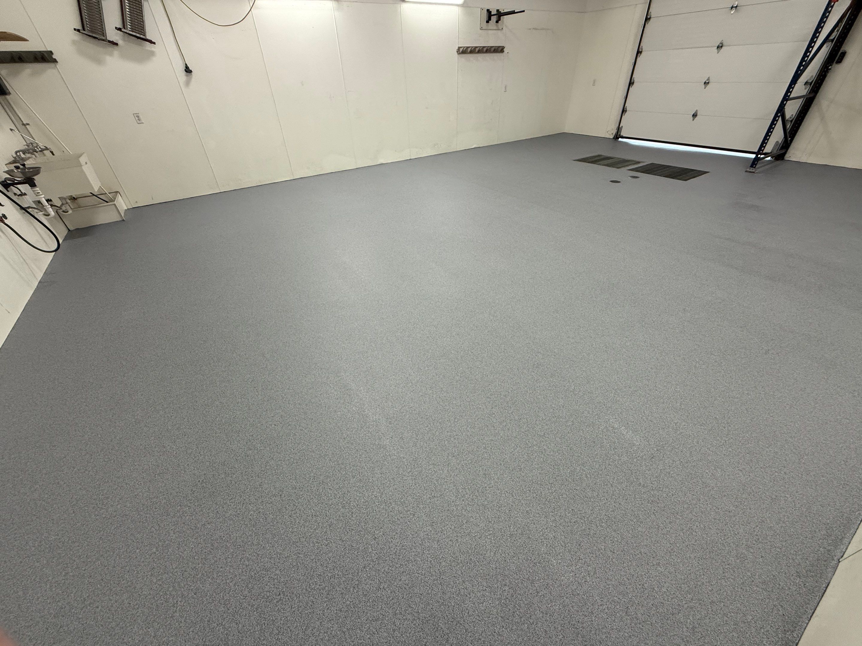 Commercial Grey Speckled Epoxy Floor Coating for Industrial Workshop by Select Painting, Coatings & Garage Cabinets