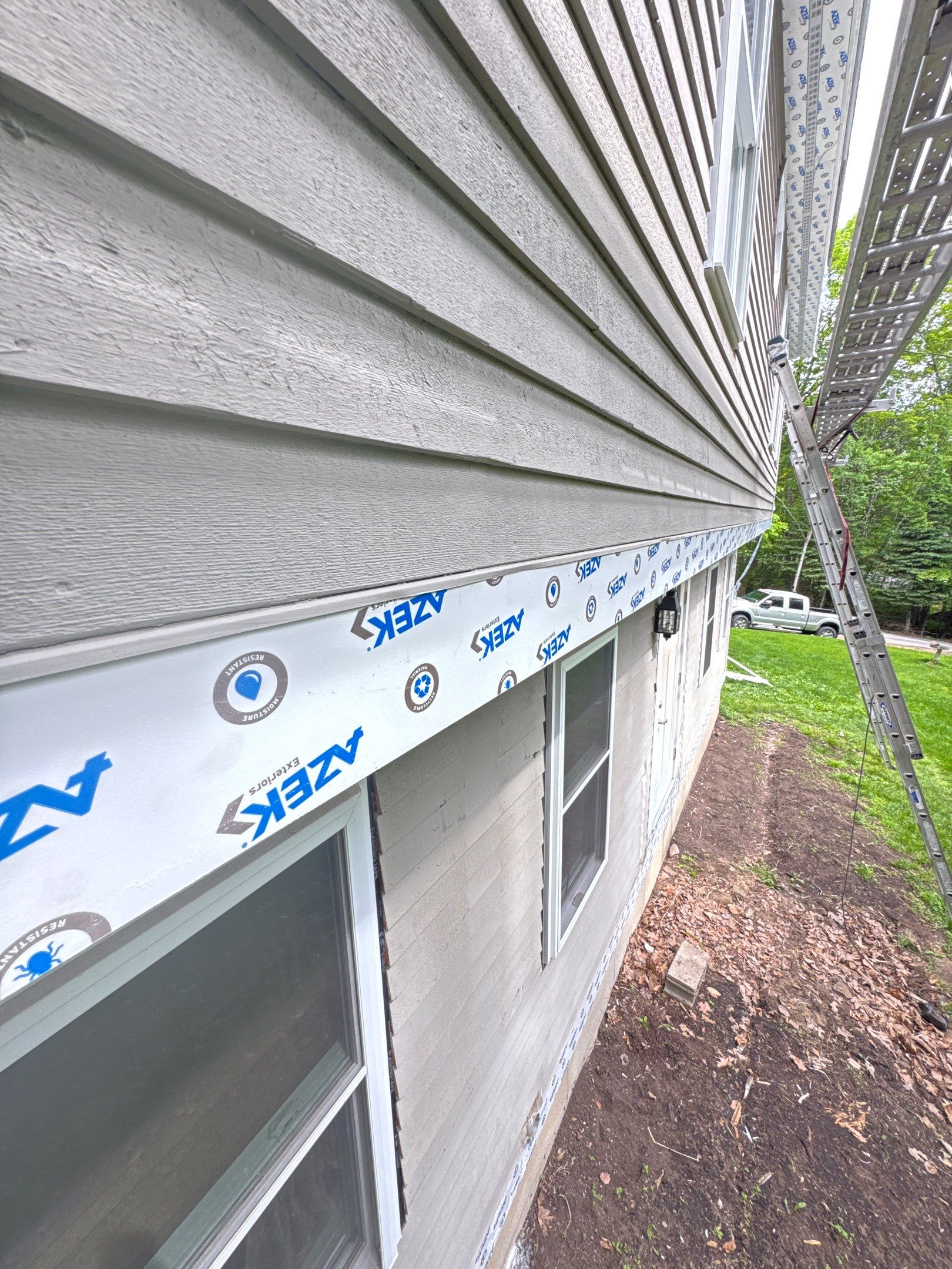 Vinyl Siding and AZEK PVC Trim Renovation in Weare by Compass exteriors