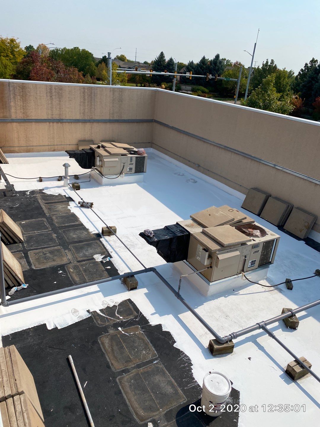 Commercial Roofing Installation using American Standard Coating - S  by A to Z Roofing