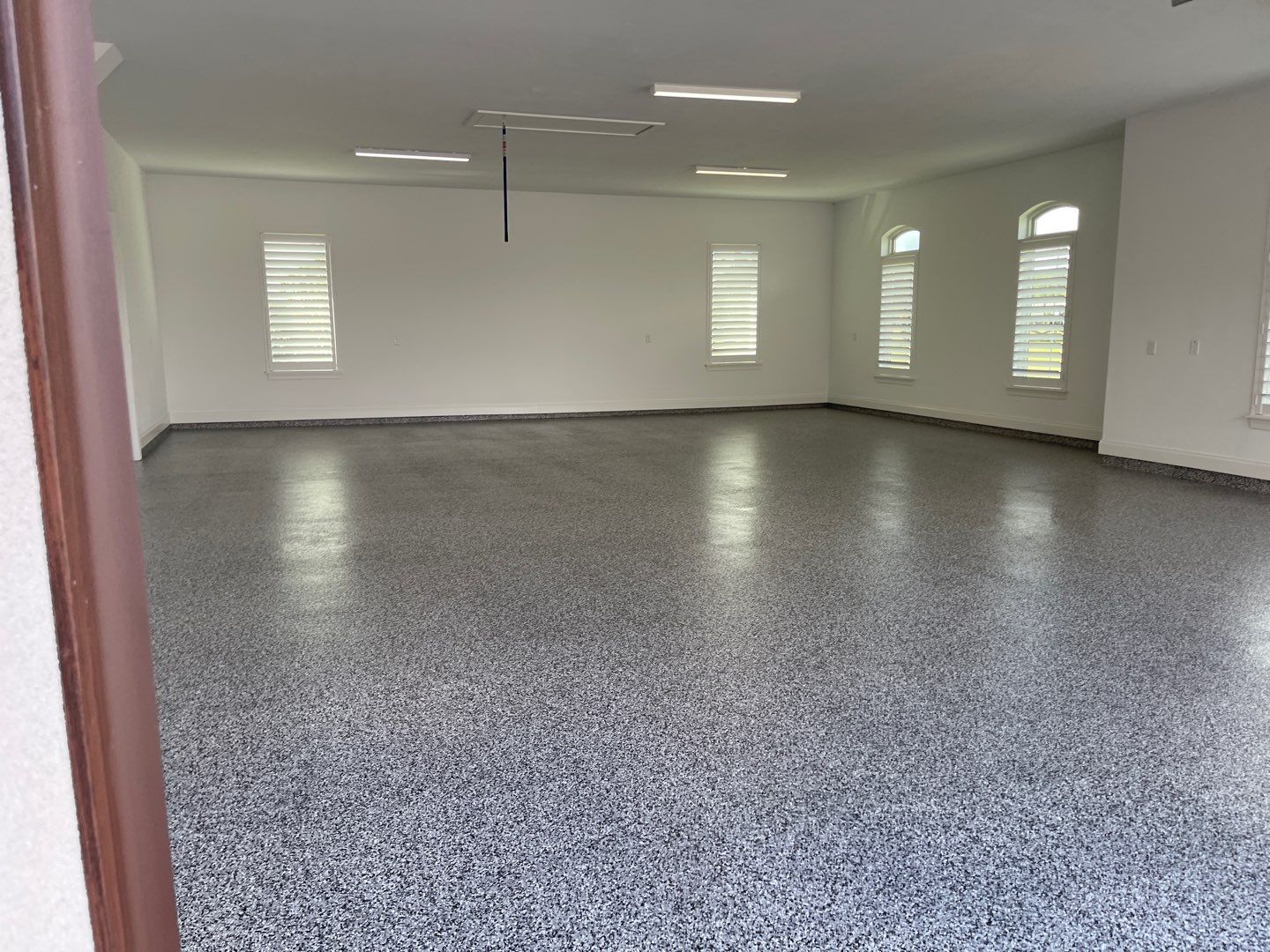 Garage Project in Newberry, FL in Domino by Cross Creek Concrete Coatings