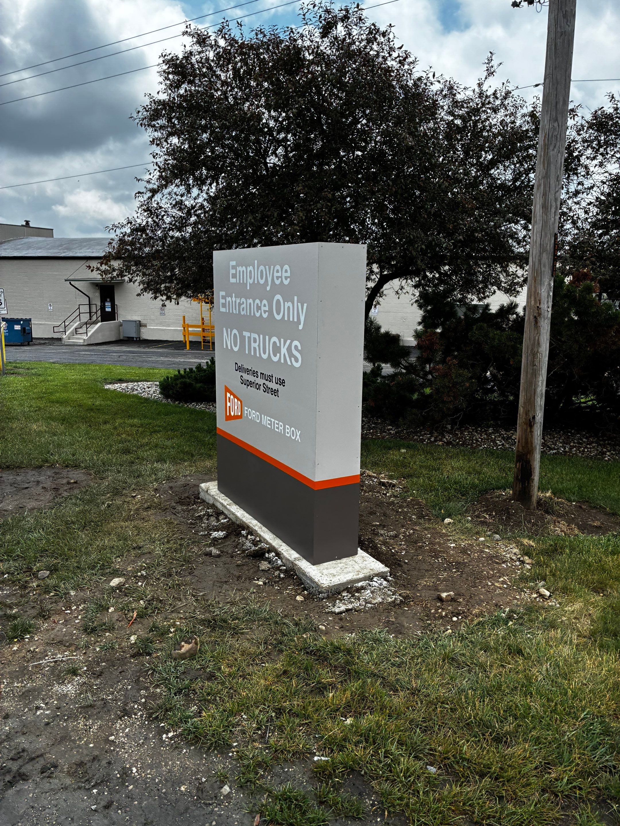 Monument Signage Installation and Site Wayfinding for Ford Meter Box by Hayes Design co