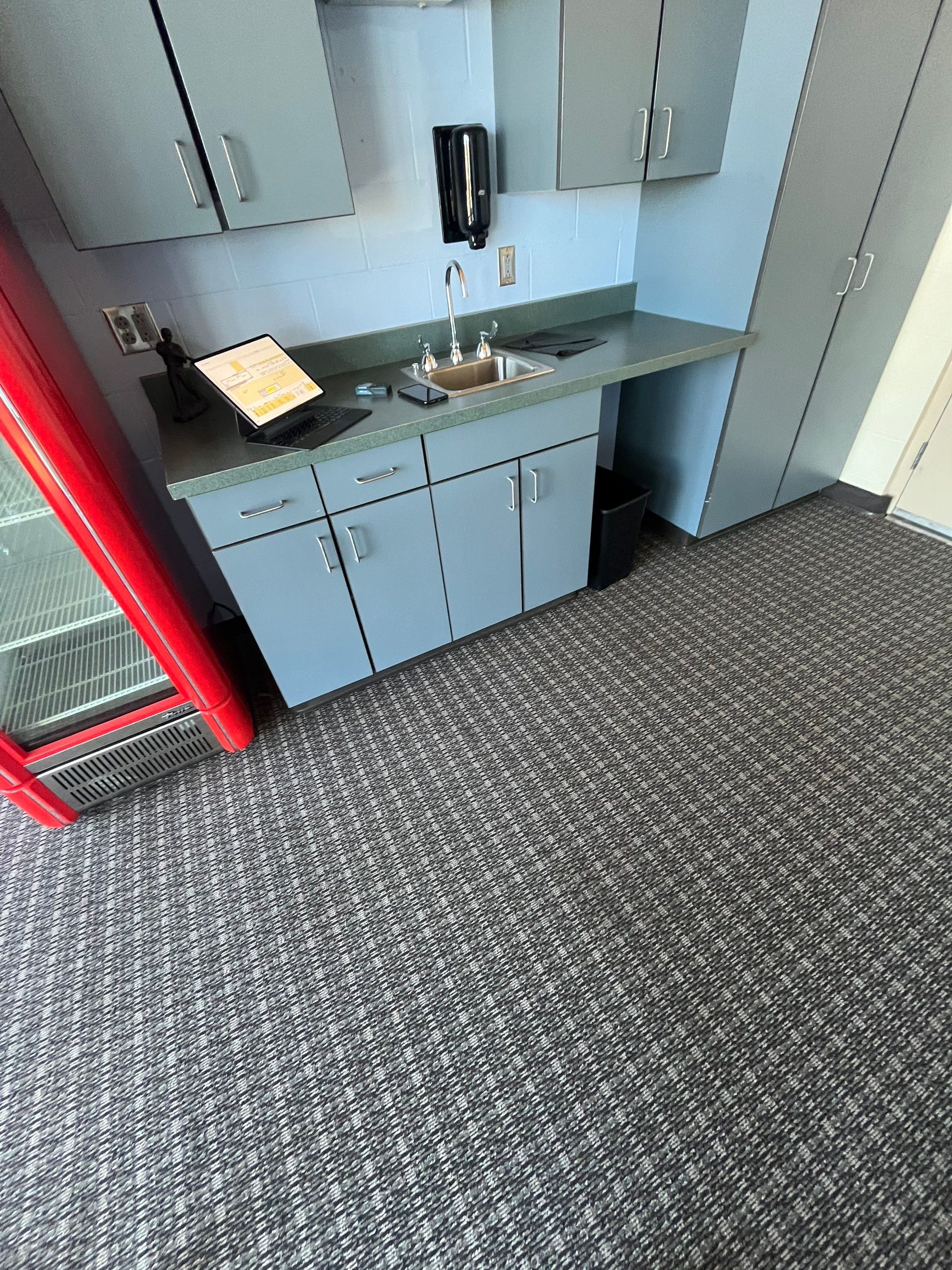 Commercial Epoxy Floor Coating for Stadium Viewing Suites in Sioux Falls by Select Painting, Coatings & Garage Cabinets