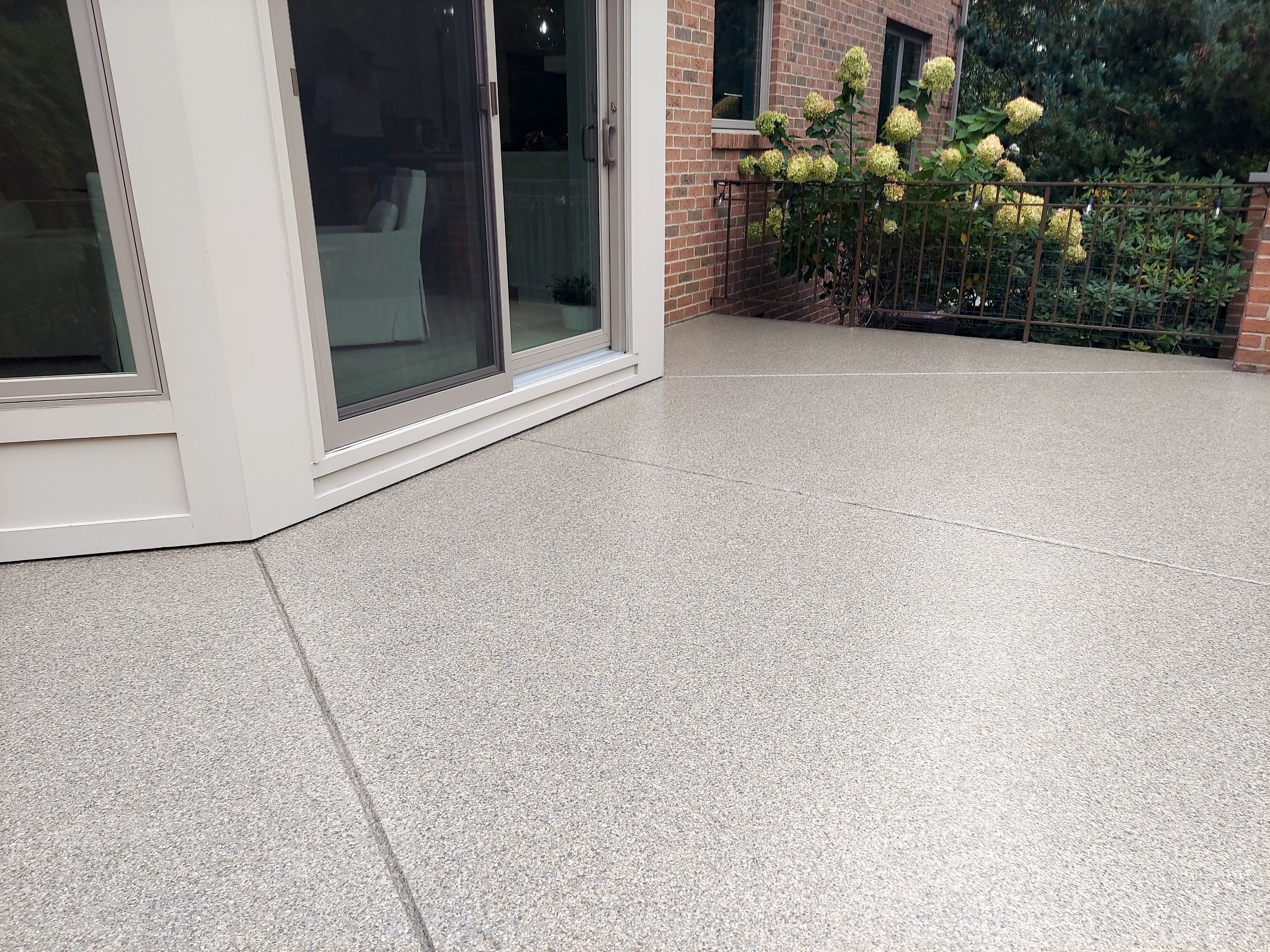 Patio in Trail Mix - Hermitage, PA by Alexander Concrete Coatings