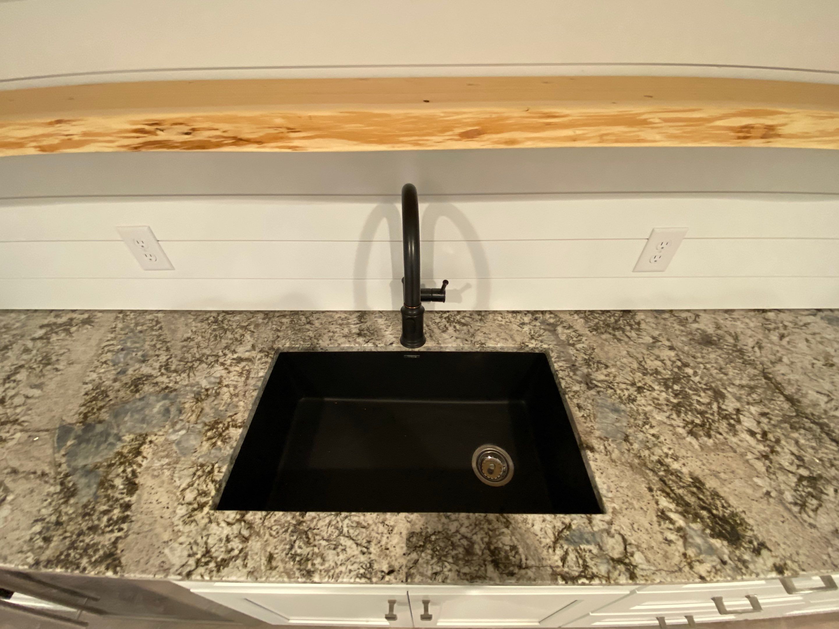 Marietta Basement Remodeling Featuring Custom Wet Bar and Marble Shower by Swift Home Renovations