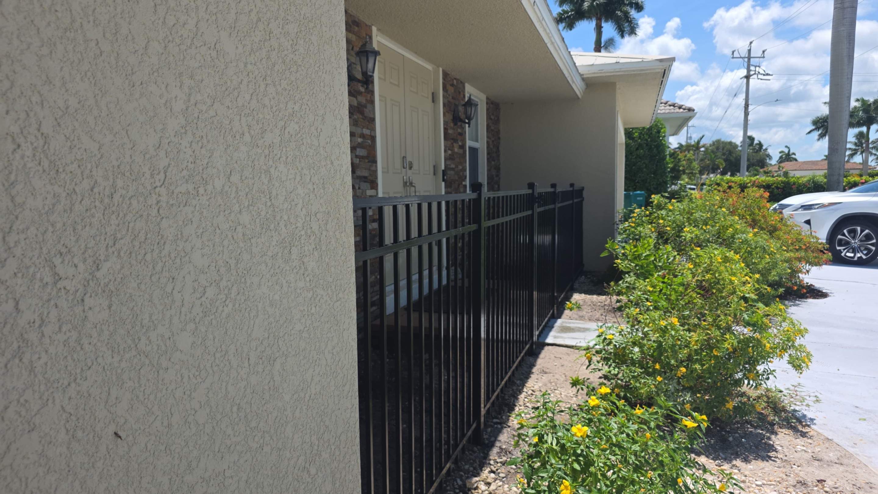 Black Aluminum Picket Fence Installation in Marco Island by True Fence LLC