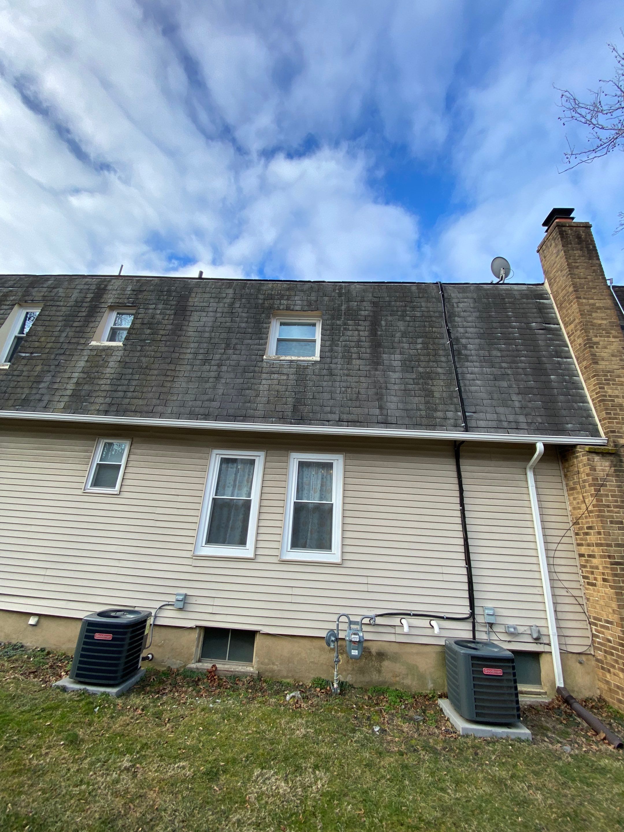 Moire Black Shingles by Reimagine Roofing