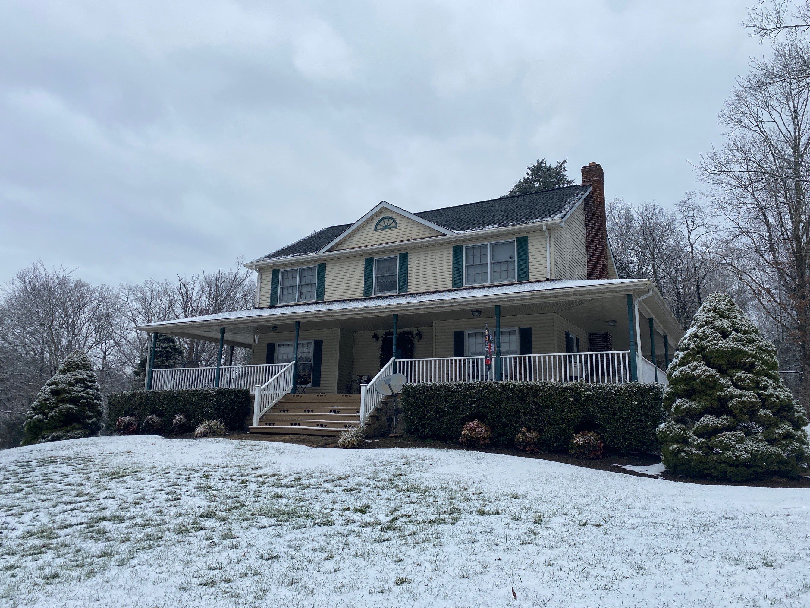 Exterior remodel including window replacement by American Home Contractors