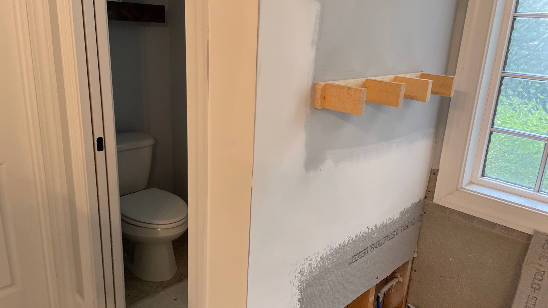 Bright Bathroom Remodel with Wall Removal, Stand Alone Tub and New Vanity by Footprints Floors of Coastal Carolina