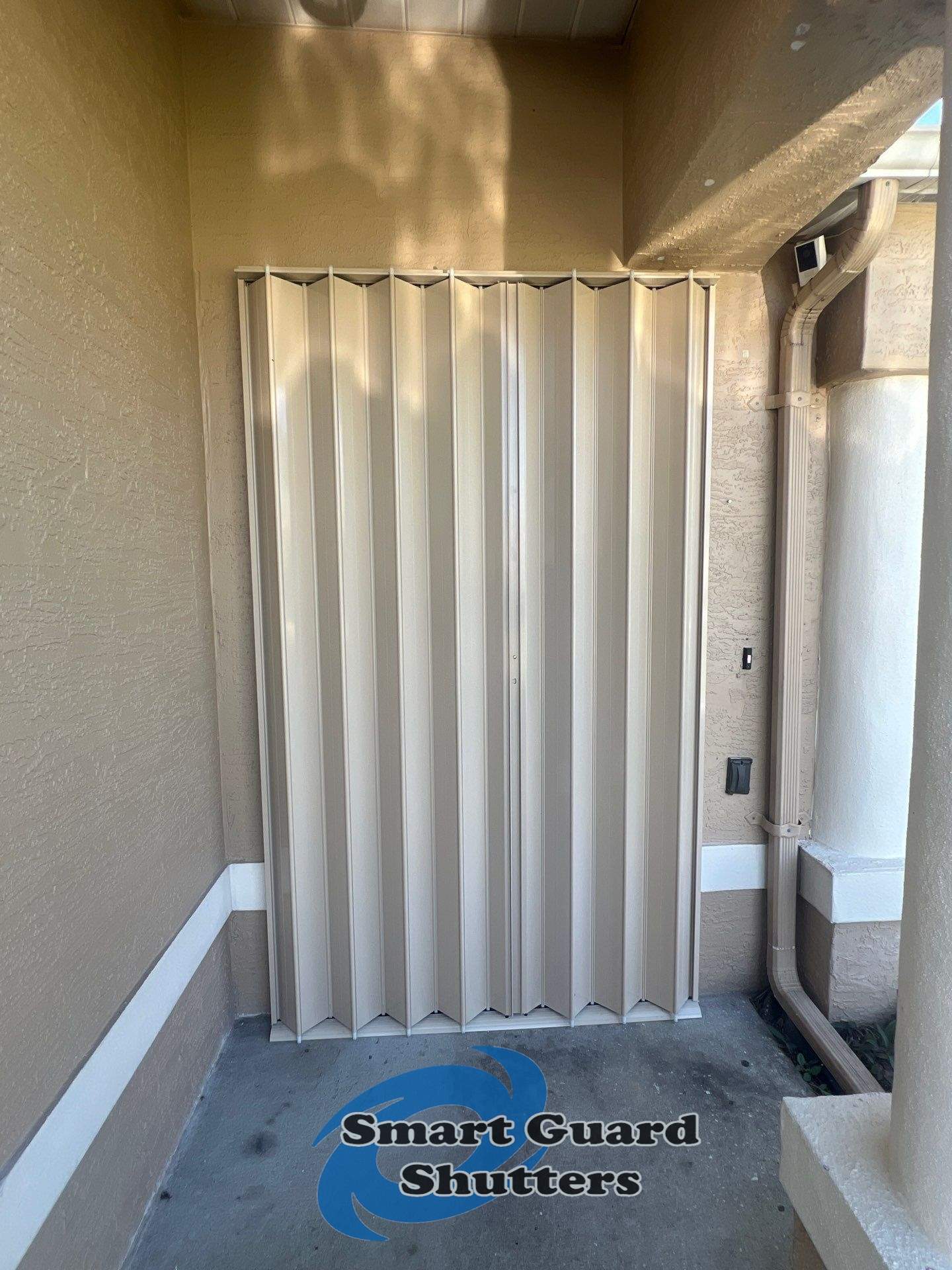 Hurricane Protection in Beige  by Smart Guard Shutters