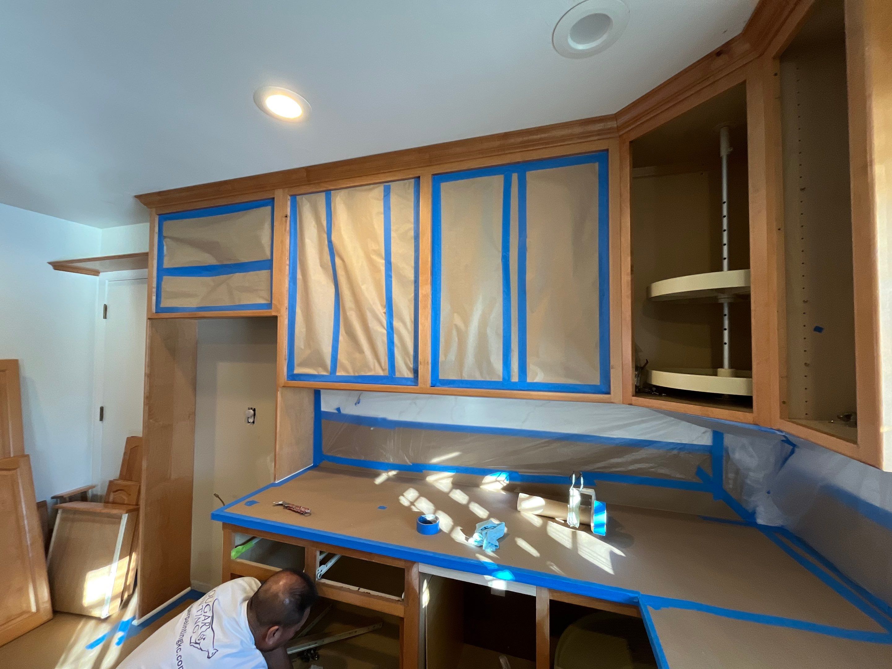 Elegant Transformation: Stained Cabinets Revamped with Sherwin-Williams Juniper by Cougar Painting