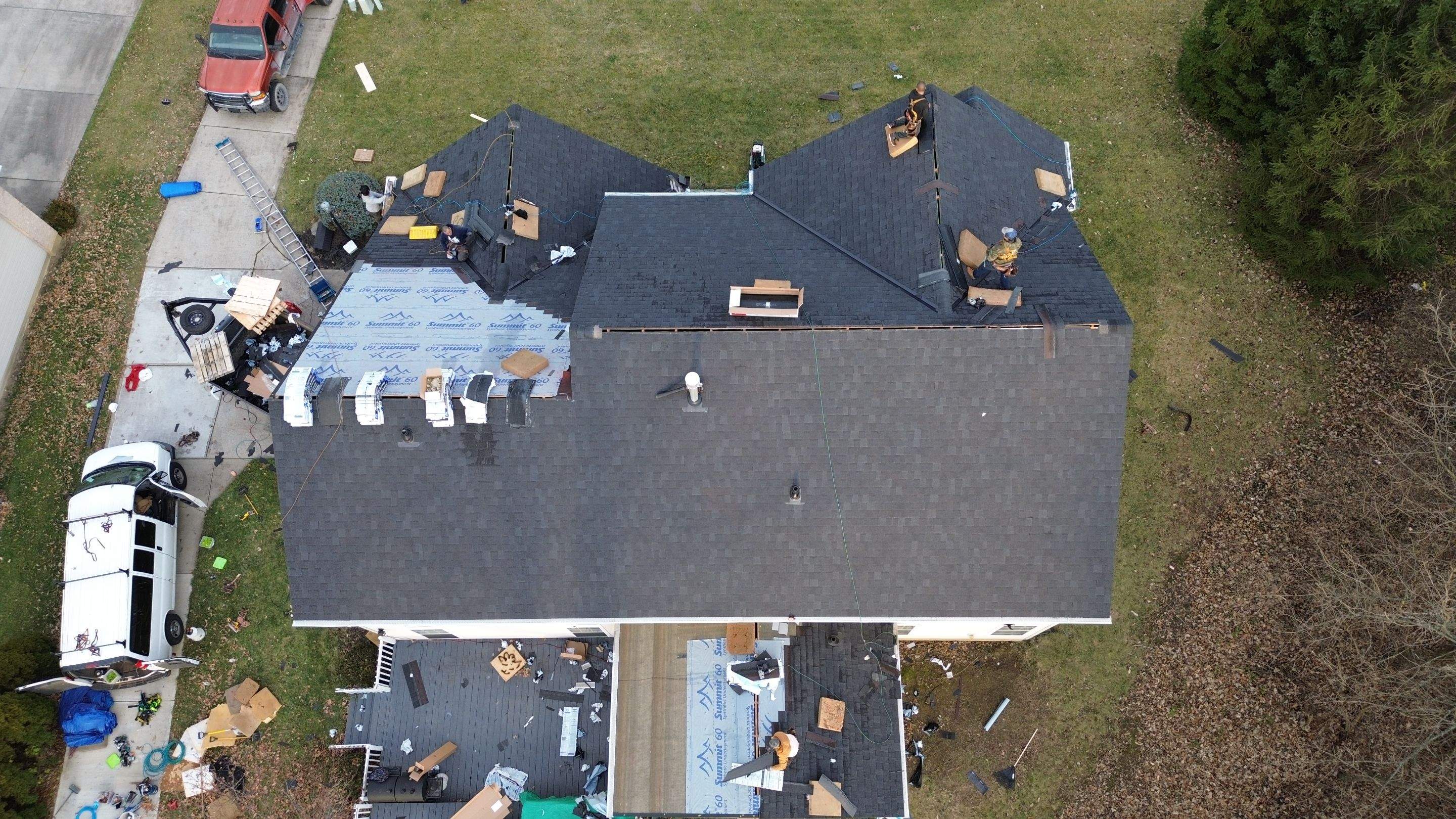 Walden Ponds - Pristine Black and Hydro Flo Gutter Guards by Tamlin Roofing