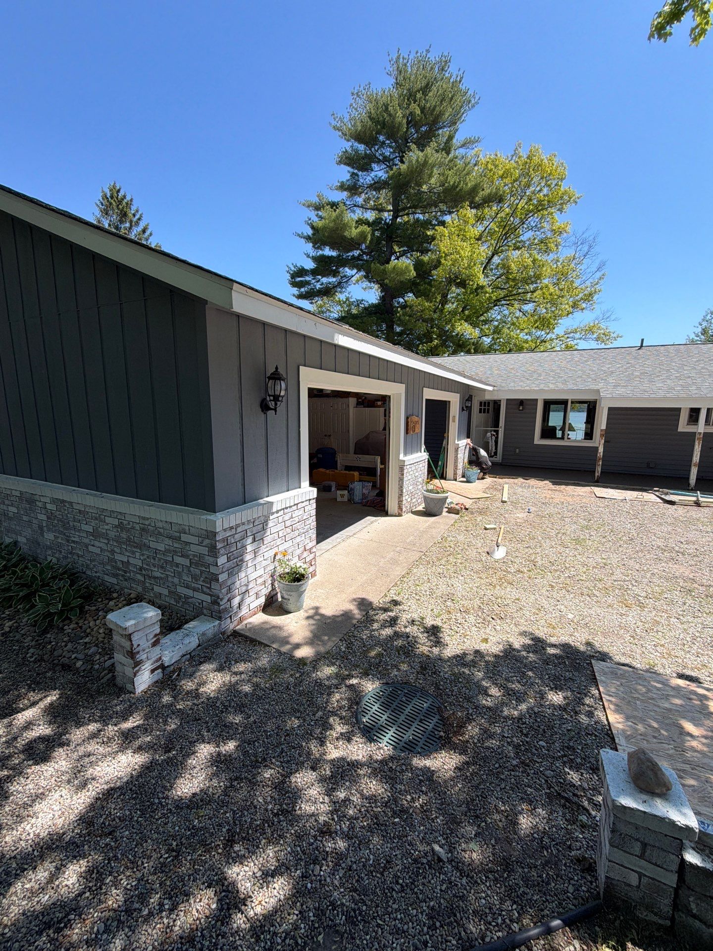 Gutter Helmet and White Seamless Gutter Installation in Rapid City by Rainbow Seamless Systems