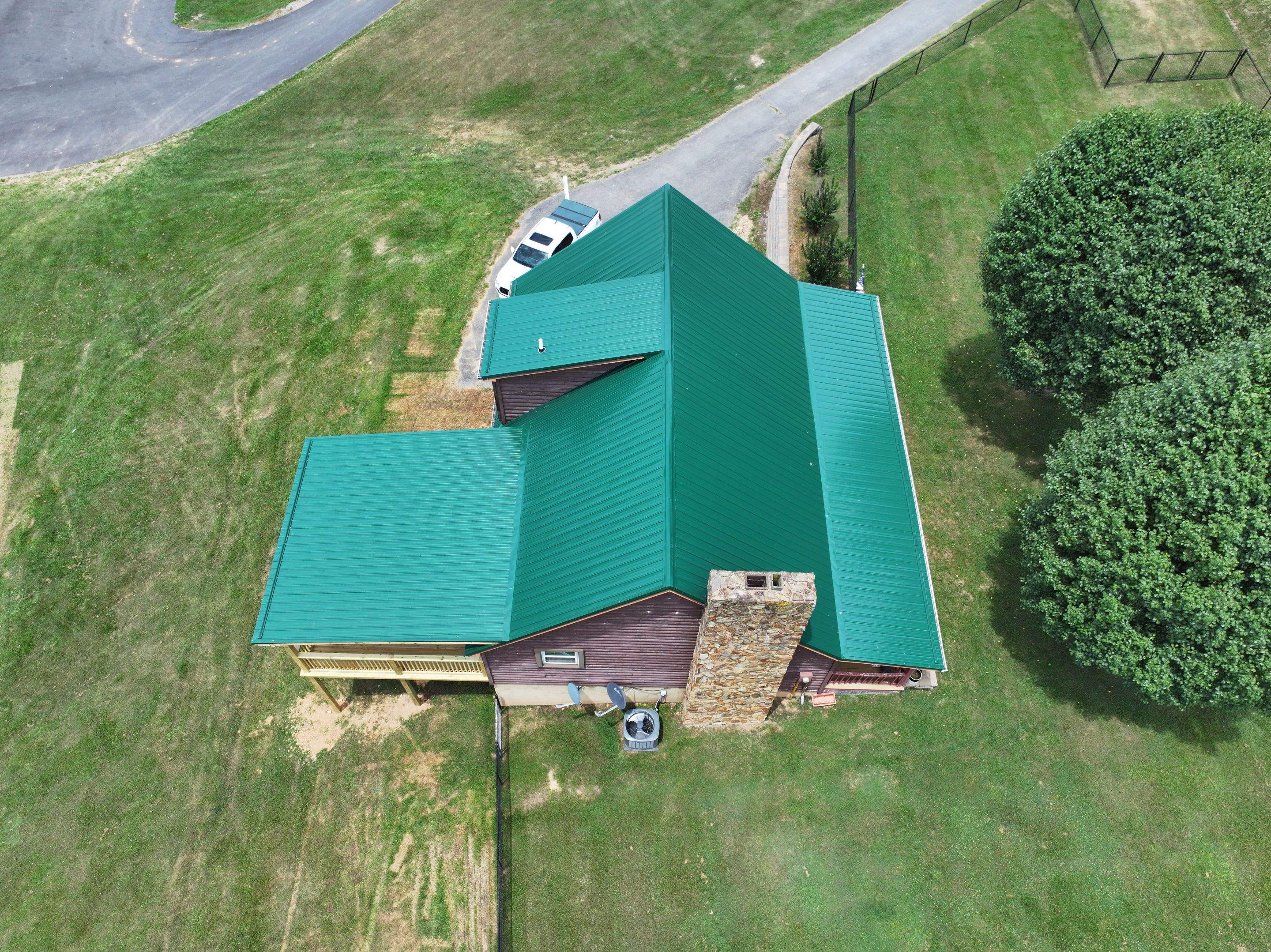 Paddle Creek Pet Ranch Cabin  by Omnia Roofing