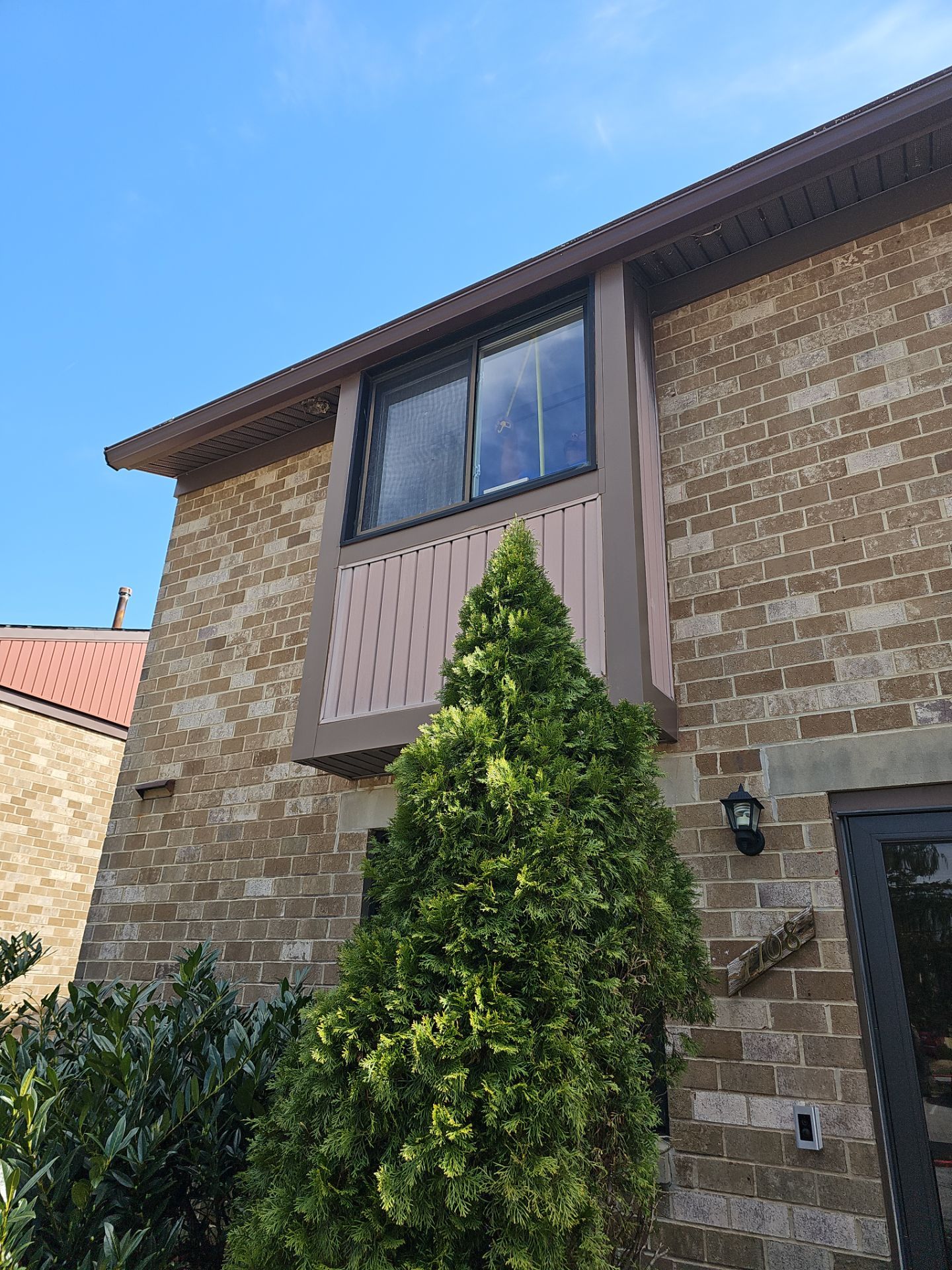 Bronze exterior Provia Sliding windows by Window Depot of Annapolis