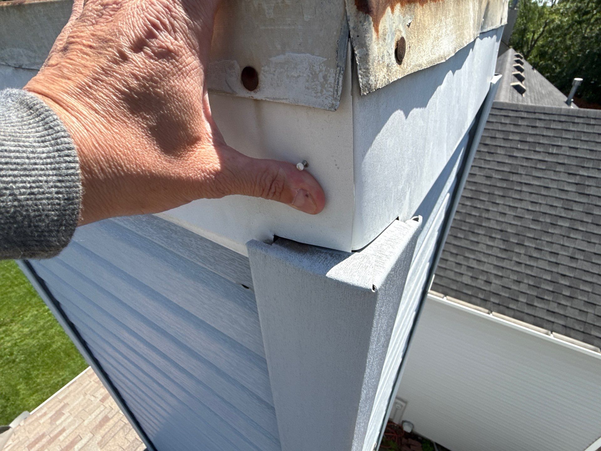 Vinyl Siding and Chimney Flashing Repair in Shawnee by Summit Roofing