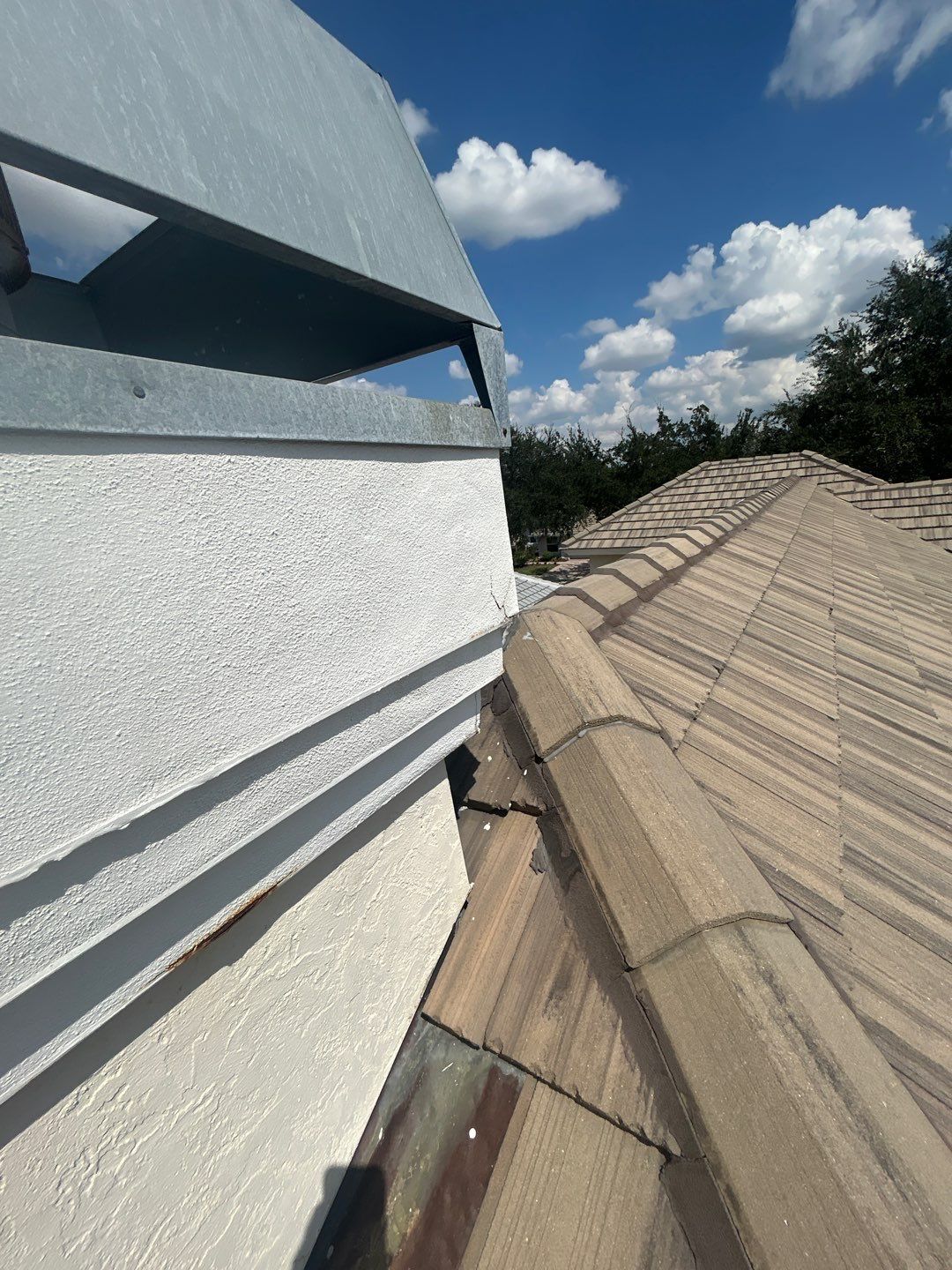 Concrete Tile Roof Repair and Gutter Maintenance in Orlando by Fortified Roofing Solutions Corp.