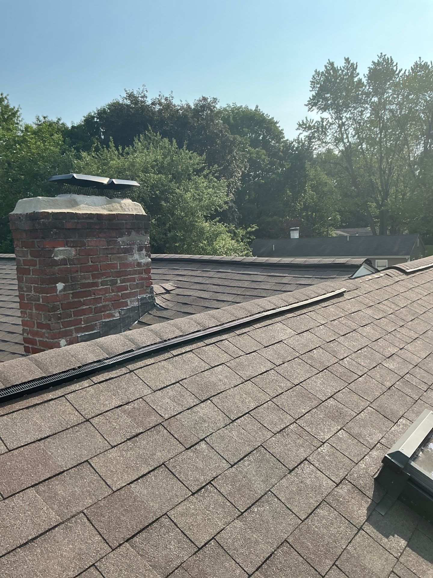 Full Roof Replacement & Chimney Repair – Onyx Black, MA by Mighty Dog Roofing of Greater Middlesex County