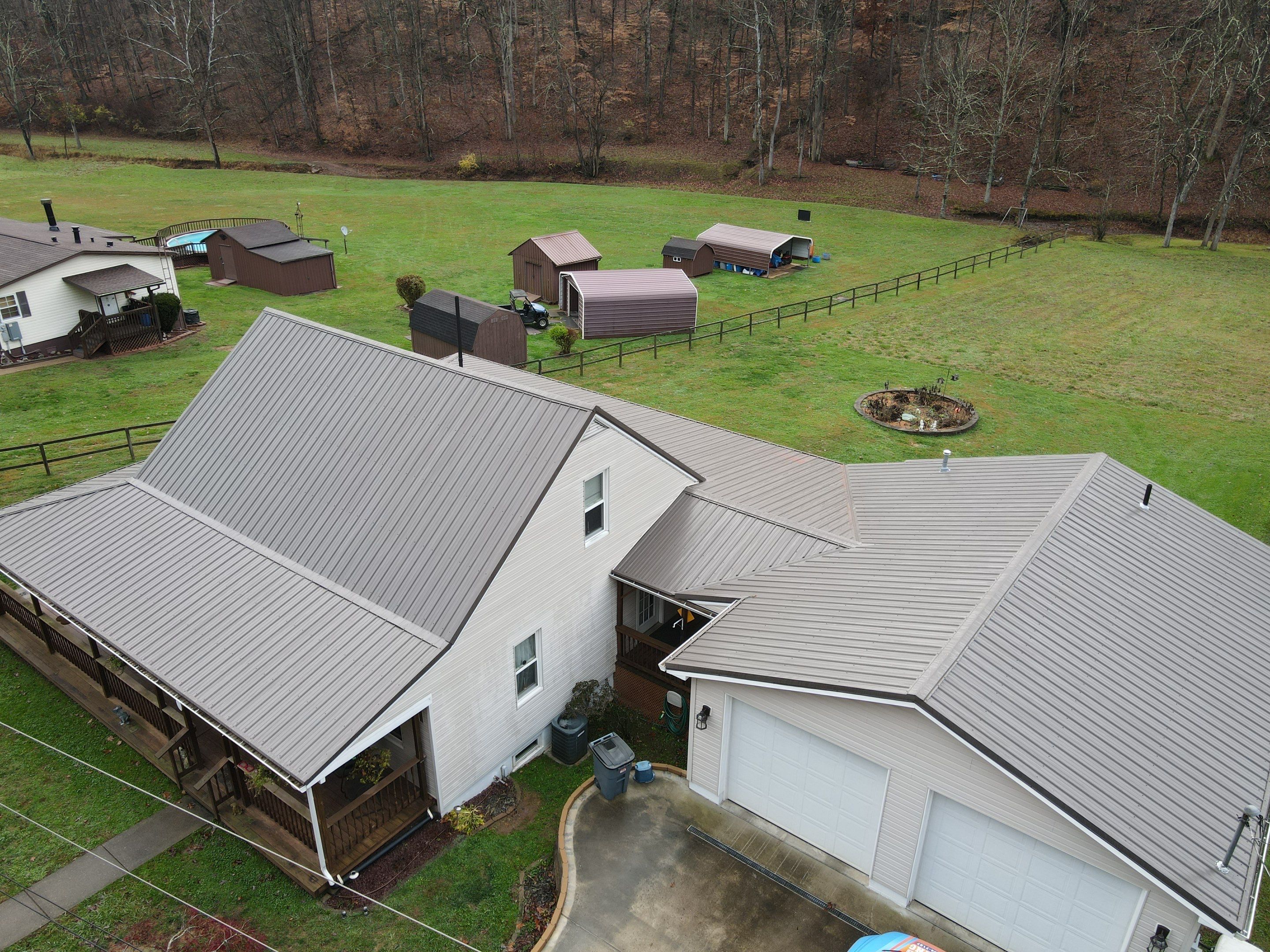 Residential Roofing Installation using Metal by Rainstoppers Roofing