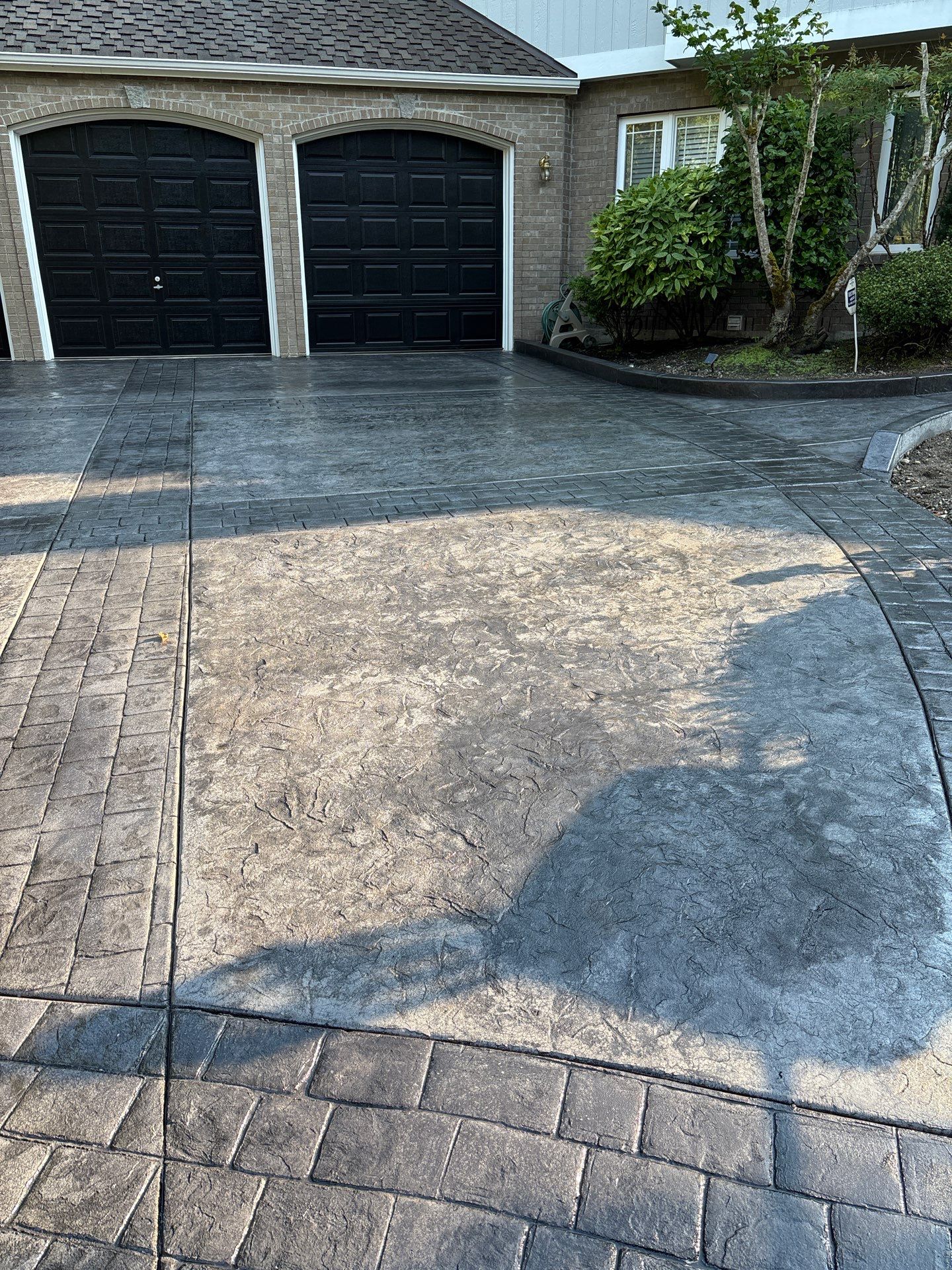 Multi-color Stamped & Sealed Concrete Driveway Renovation | Mukilteo by Jireh Asphalt & Concrete Inc