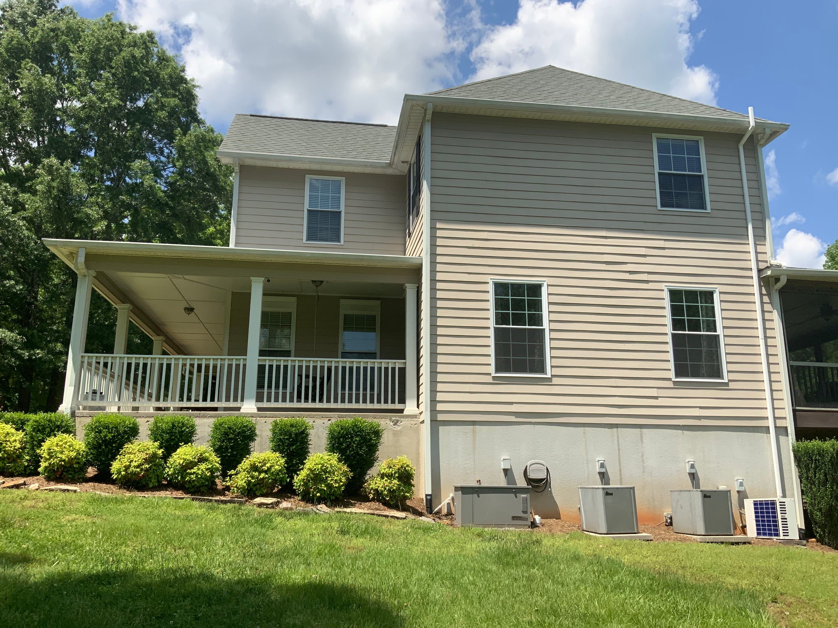 Siding replacement, exterior painting, and front door staining. by GonzalezPainters & Contractors Inc