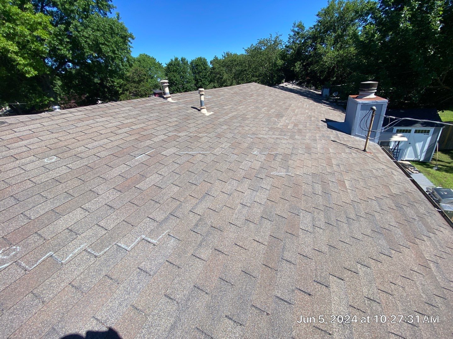 Roof inspection in Bartlesville by Decor Roofing & Restoration