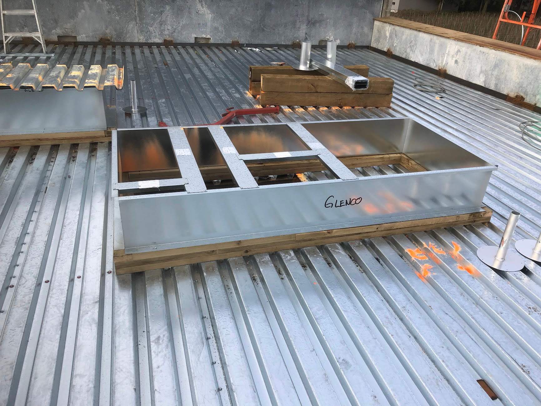 Commercial Roofing Installation using EPDM loose lay with balast by Top Notch Roofing Inc